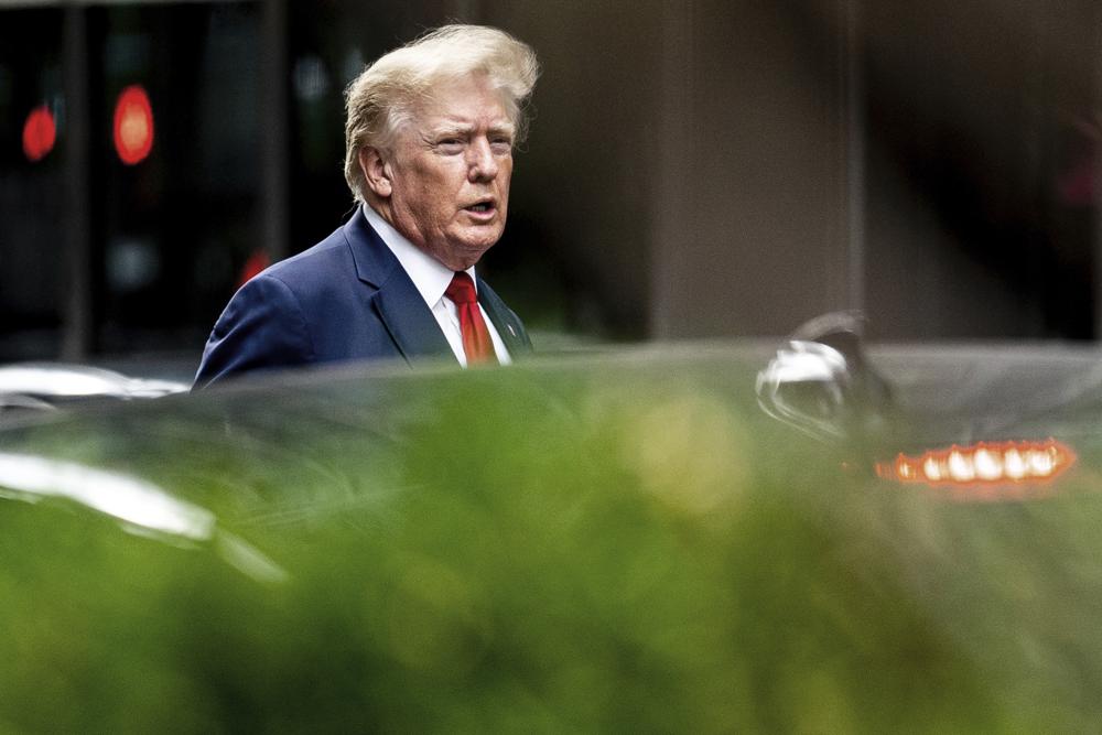 FILE - Former President Donald Trump departs Trump Tower, Aug. 10, 2022, in New York, on his way to the New York attorney general's office for a deposition in civil investigation. A newly released FBI document helps flesh out the contours of an investigation into classified documents at Trump’s Florida estate. But plenty of questions remain, especially since half the document was blacked out. (AP Photo/Julia Nikhinson, File)