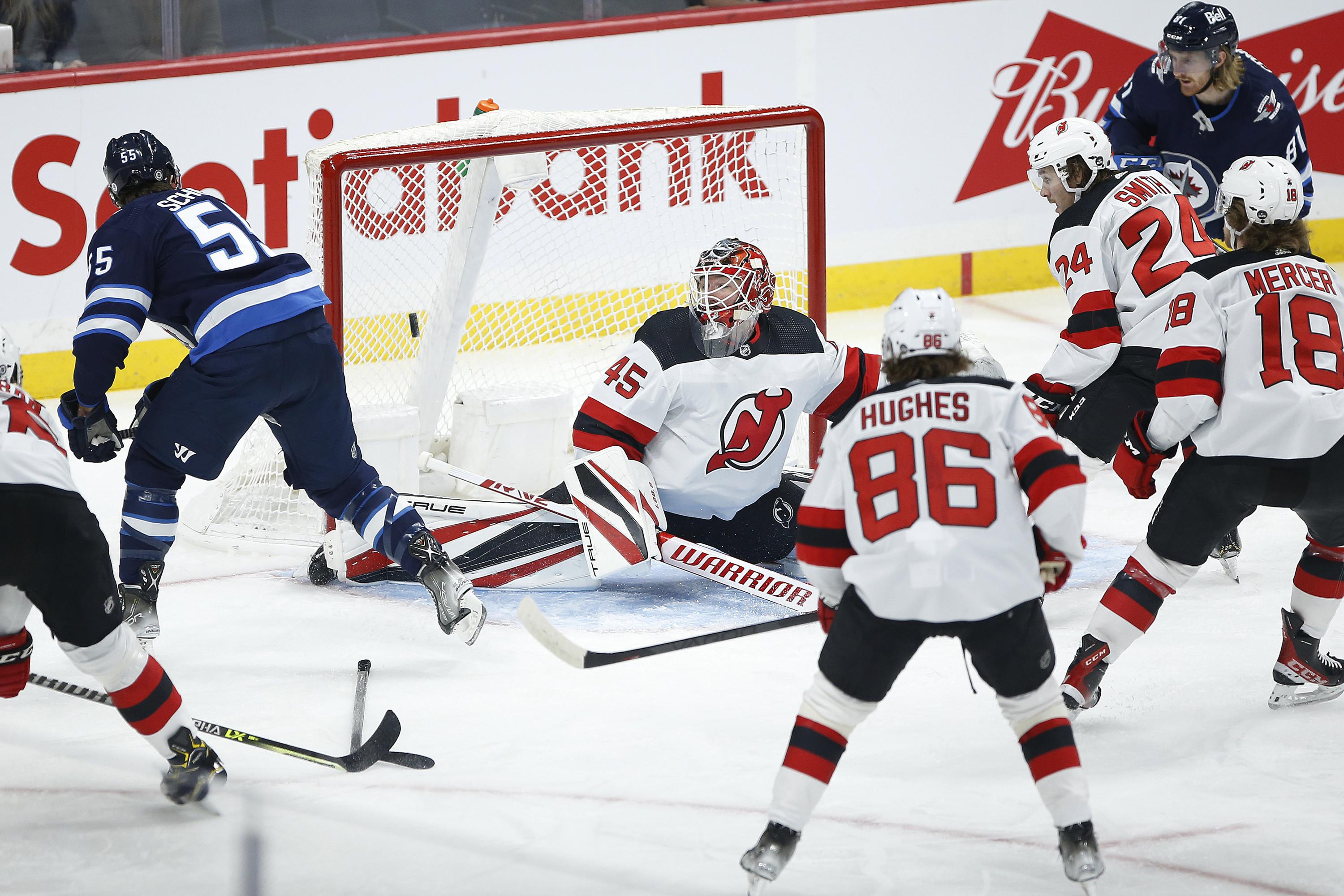 Scheifele has hat trick, Jets beat Devils 8-4 | AP News