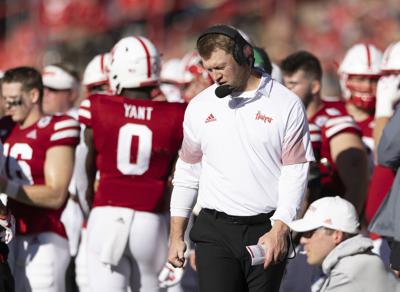 Frost agrees to salary cut in '22; four assistants fired | AP News Frost agrees to salary cut in '22; four assistants fired | AP News