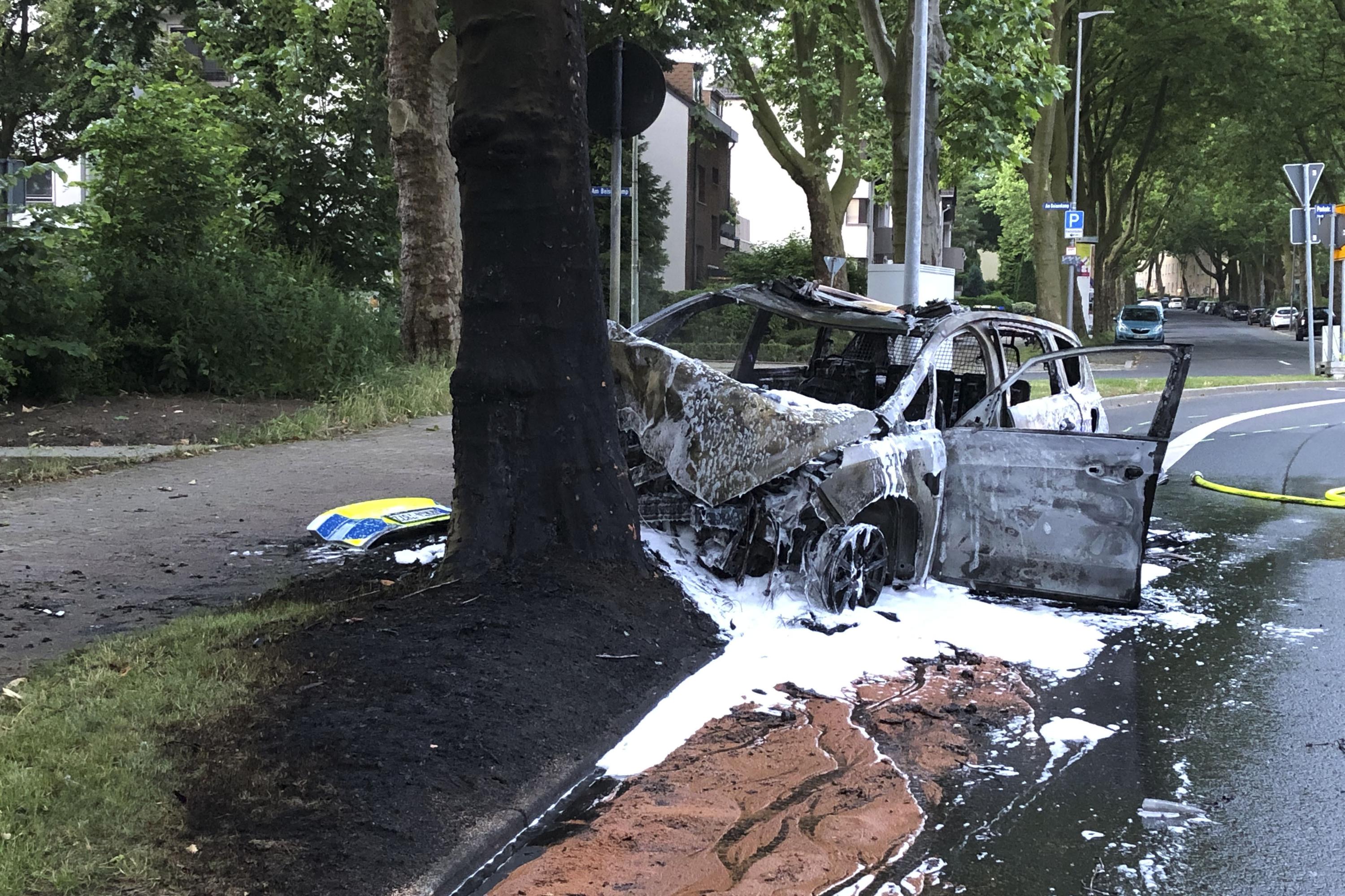 Students Rescue German Police From Burning Patrol Car
