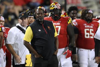 Maryland prepares for program's first road game at Illinois | AP News