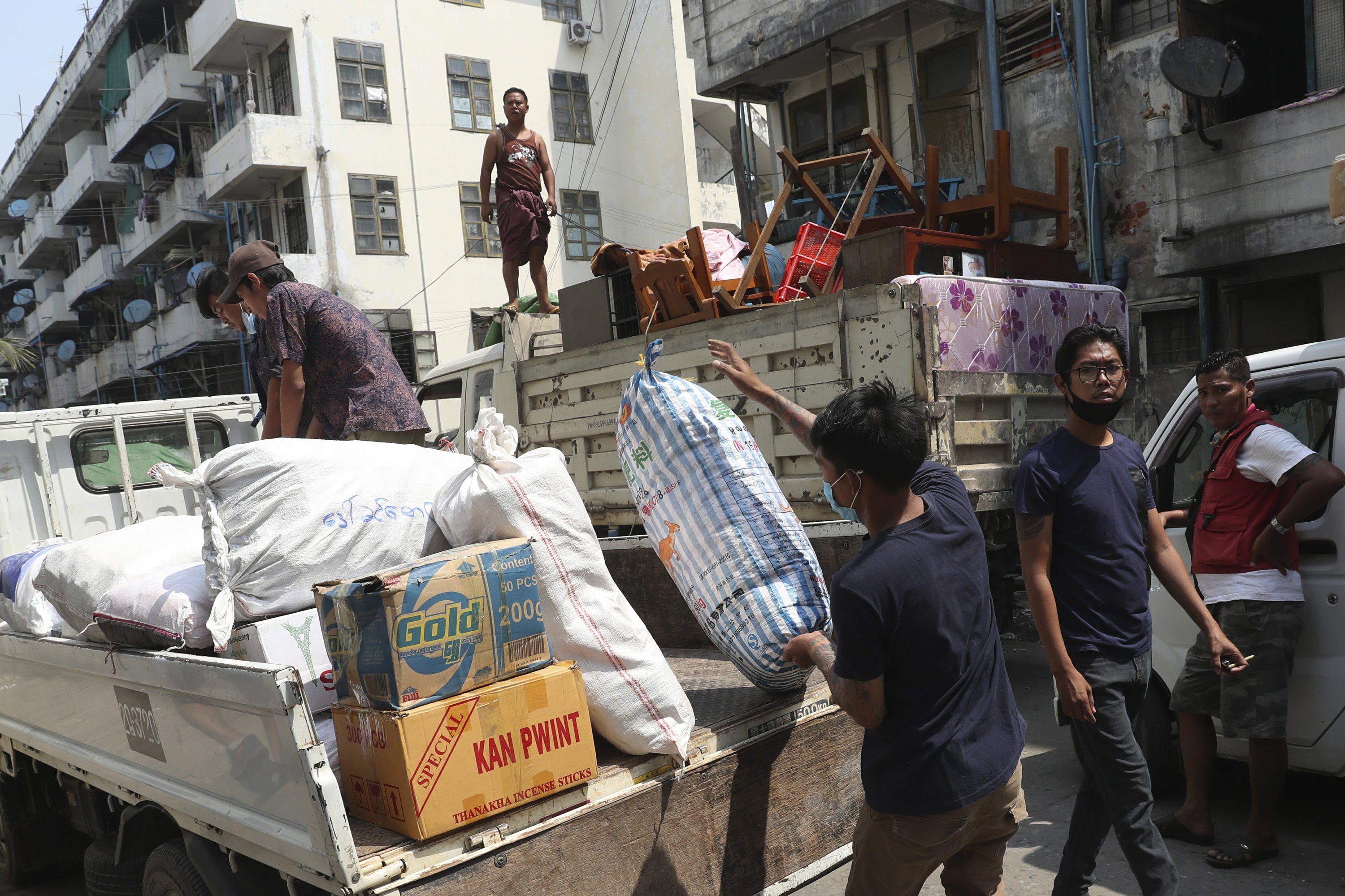 Rail workers on strike in Myanmar leave while protests continue