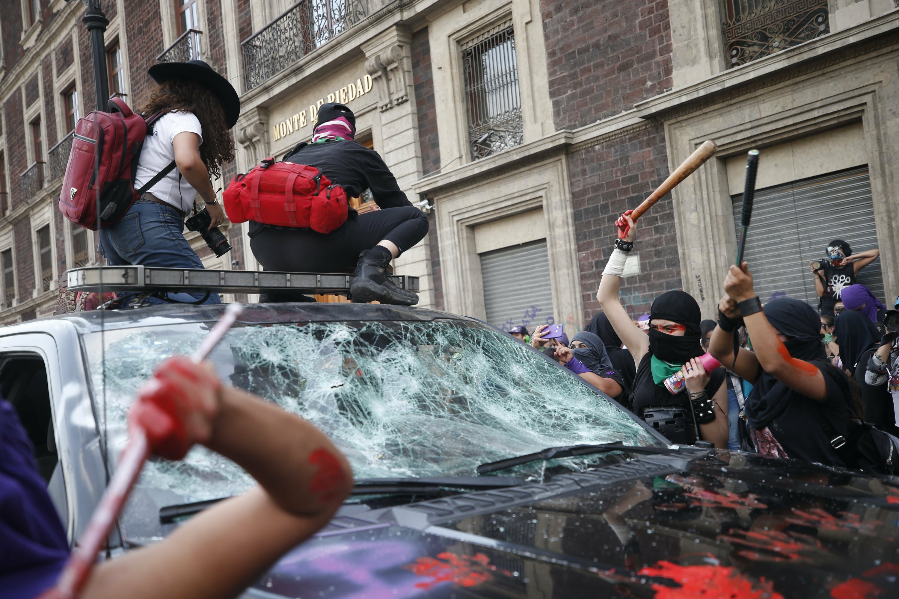 Mexican Women Paint March To Protest Gender Violence