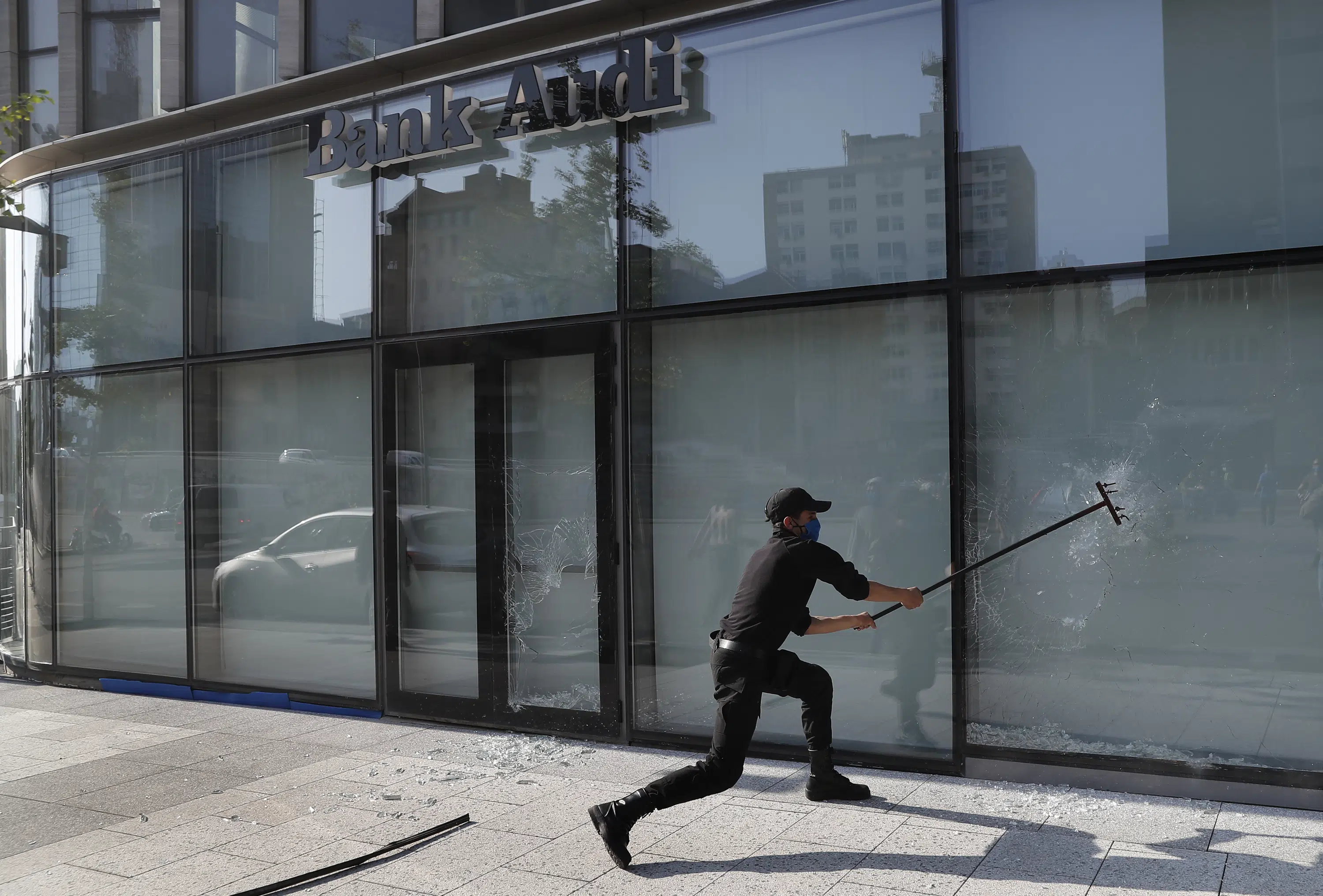 Protesters in Beirut smash banks as Lebanese pound spirals Protesters in Beirut smash banks as Lebanese pound spirals