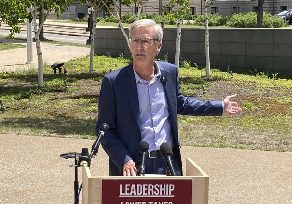 Republican gubernatorial candidate Scott Jensen announces a crime-fighting plan on Thursday, June 9, 2022, that would stiffen penalties for violent crime while boosting the role of the State Patrol and Minnesota National Guard. Jensen spoke at a news conference outside the State Capitol in St. Paul. (AP Photo/Steve Karnowski)