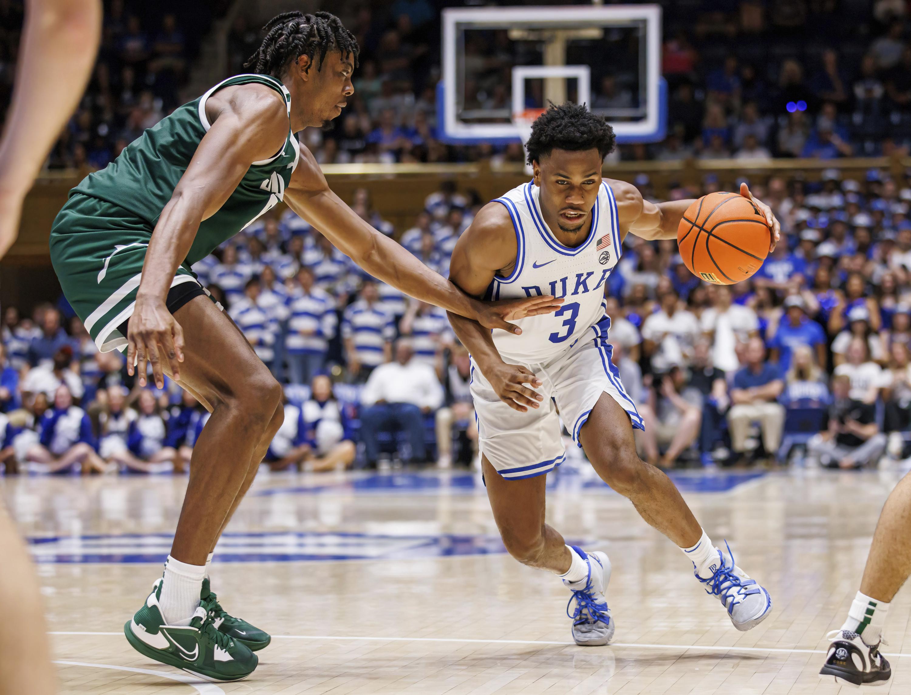 Roach leads No. 7 Duke past Jacksonville in Scheyer's debut AP News