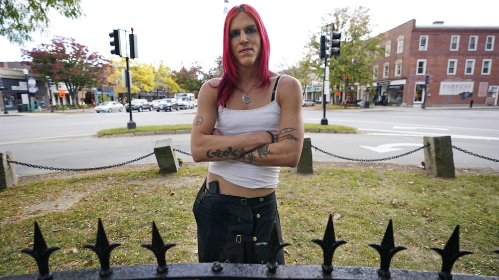Aria DiMezzo, a Republican candidate for sheriff in Cheshire County, New Hampshire, poses at Central Square, Tuesday, Oct. 6, 2020, in Keene, N.H. Republicans in the New Hampshire county are wrestling with the fact that DiMezzo, who was nominated in last month's primary, is a transgender satanist whose campaign slogan disparages the police. (AP Photo/Charles Krupa)