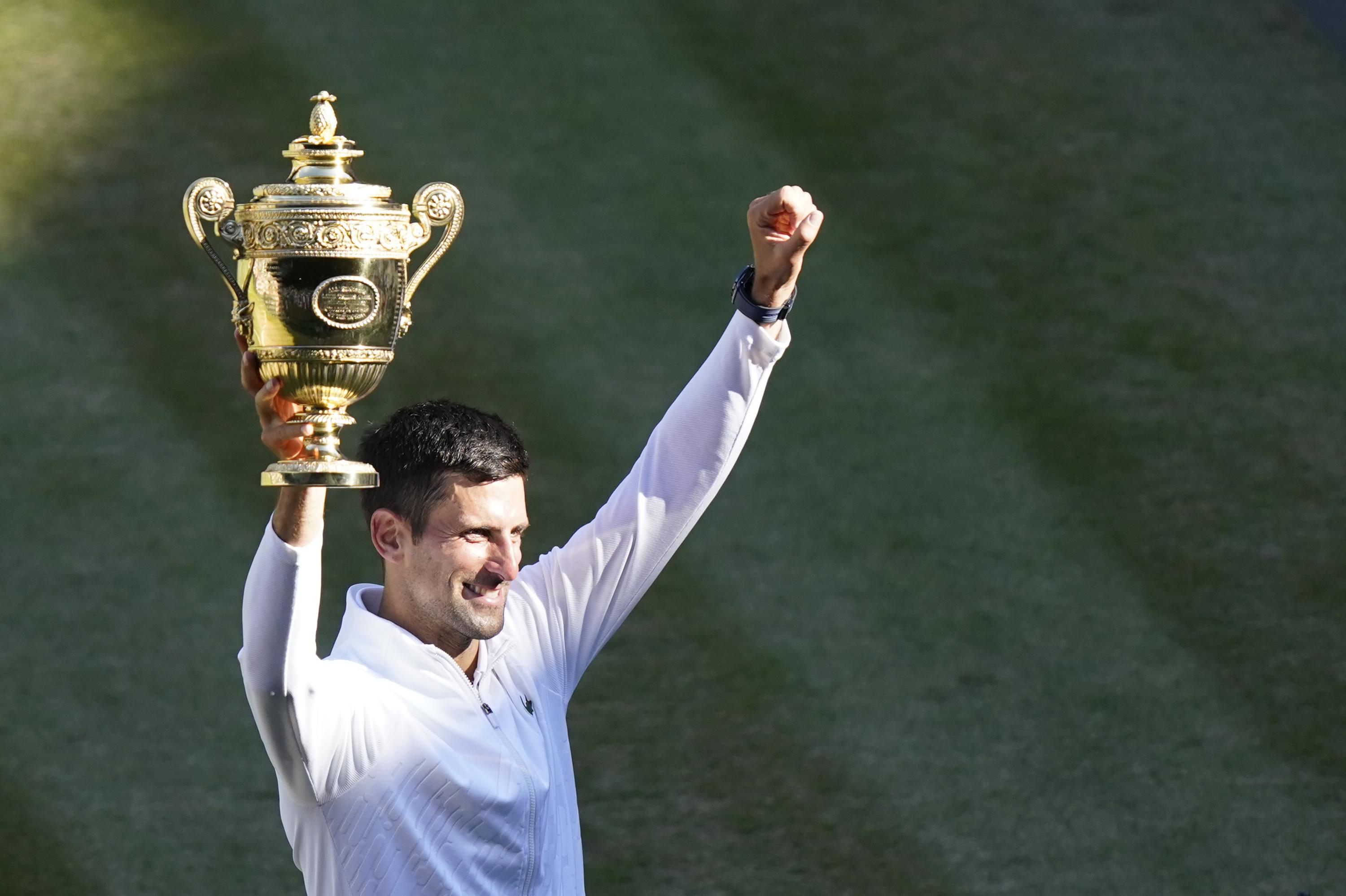 astronaut Op de een of andere manier porselein Djokovic tops Kyrgios for 7th Wimbledon, 21st Slam trophy | AP News