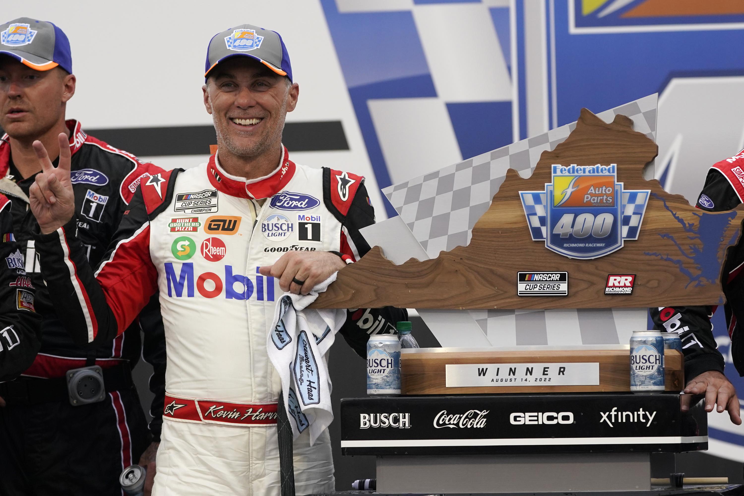 AUTO RACING: Harvick wins again, becomes new title favorite | AP News