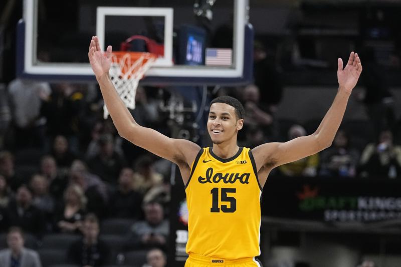 Iowa forward Keegan Murray celebrates at the end of an NCAA college basketball game against Purdue at the Big Ten Conference tournament, Sunday, March 13, 2022, in Indianapolis. Iowa won 75-66. (AP Photo/Darron Cummings)