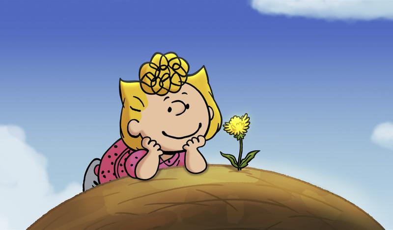 This image released by Peanuts Worldwide LLC shows Peanuts character Sally in a scene from the special  “It’s the Small Things, Charlie Brown,"  debuting on Apple TV+ on Friday. In the 40-minute film, Charlie Brown’s hope to finally win the neighborhood championship baseball game is derailed when his little sister, Sally, choses to protect a dandelion growing on the pitcher’s mound. Soon everyone is cleaning up the ballfield. (Peanuts Worldwide LLC/Apple via AP)