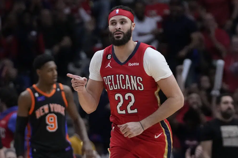 FILE - New Orleans Pelicans forward Larry Nance Jr. (22) reacts after making a basket in the second half of an NBA basketball game against the New York Knicks in New Orleans, Friday, April 7, 2023. The Pelicans won 113-105. The San Francisco 49ers have reached an agreement to take over English soccer club Leeds with NBA players Larry Nance Jr. and T.J. McConnell joining the ownership group as minority investors. (AP Photo/Gerald Herbert, File)