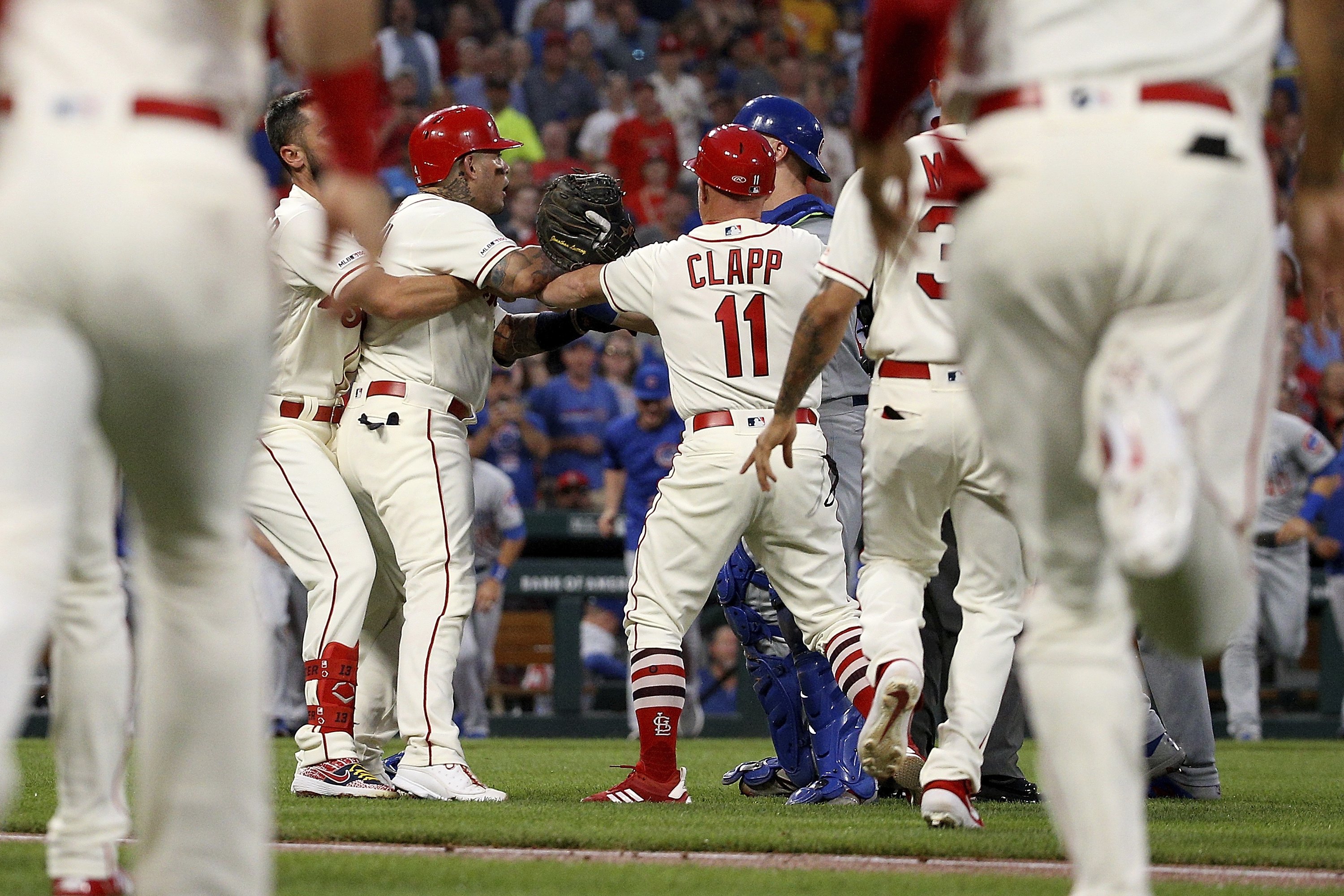 Cardinals lose to Cubs, NL Central race goes to final day AP News