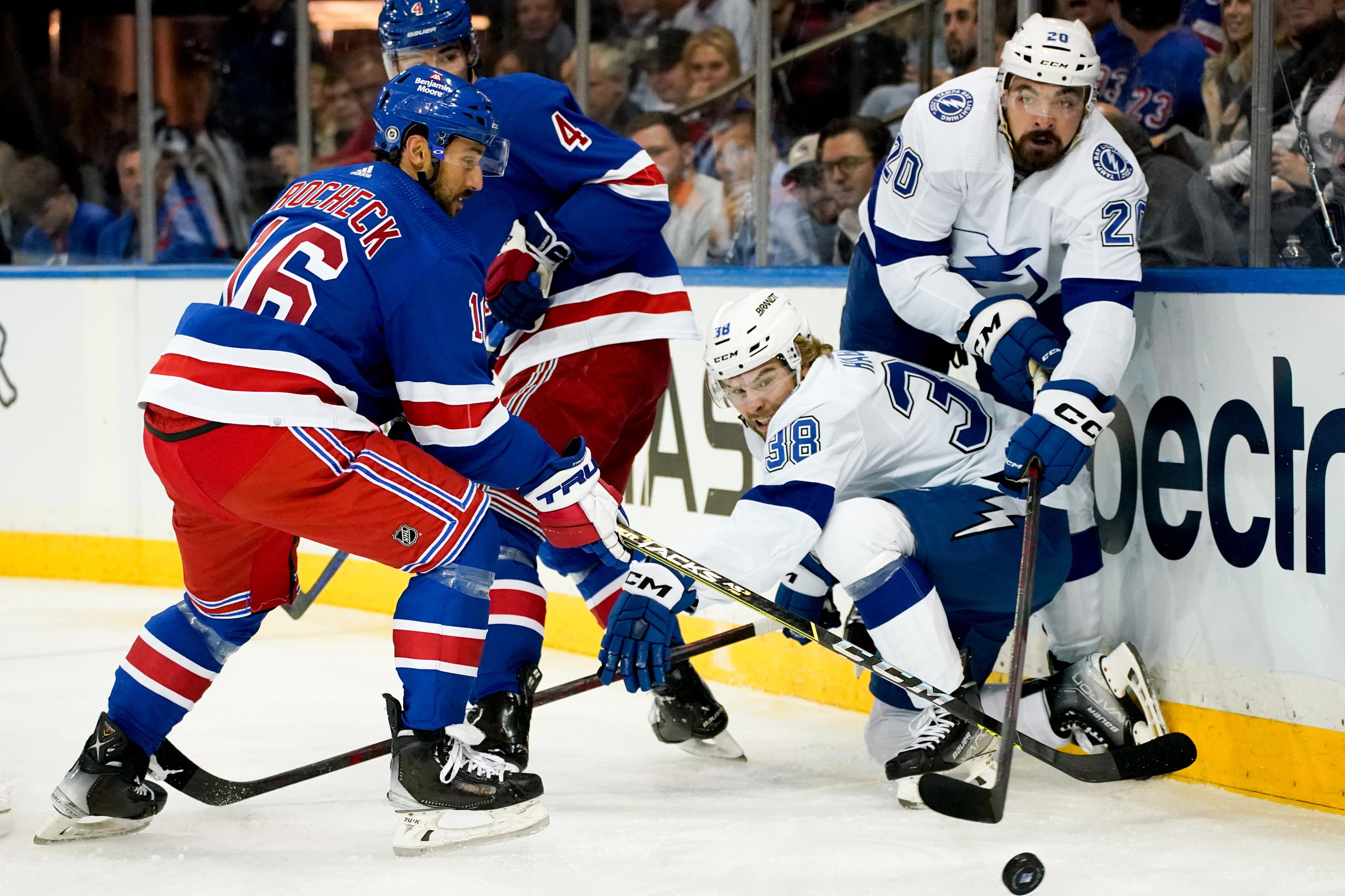 Zibanejad scores 2, Rangers open with 31 win over Lightning AP News