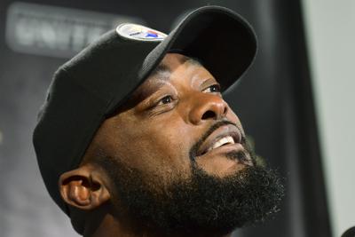 Mike Tomlin: idea he's a candidate for college jobs 'a joke' | AP News