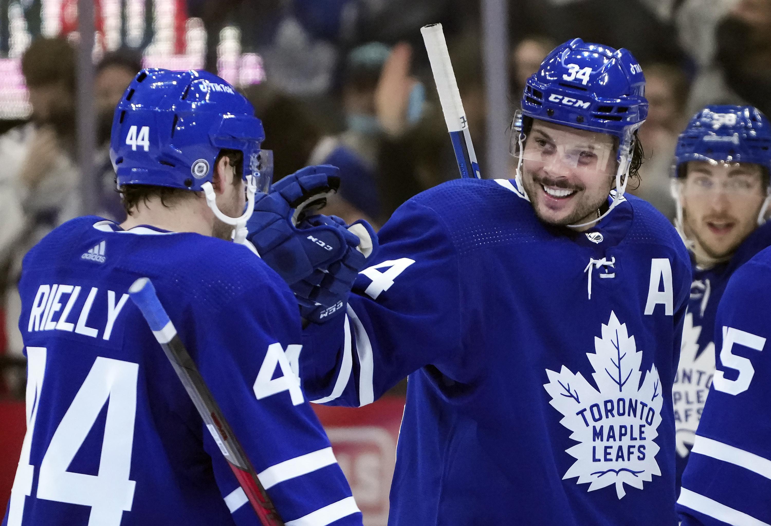 Matthews hat trick powers Maple Leafs to 6 4 win over Kraken AP News