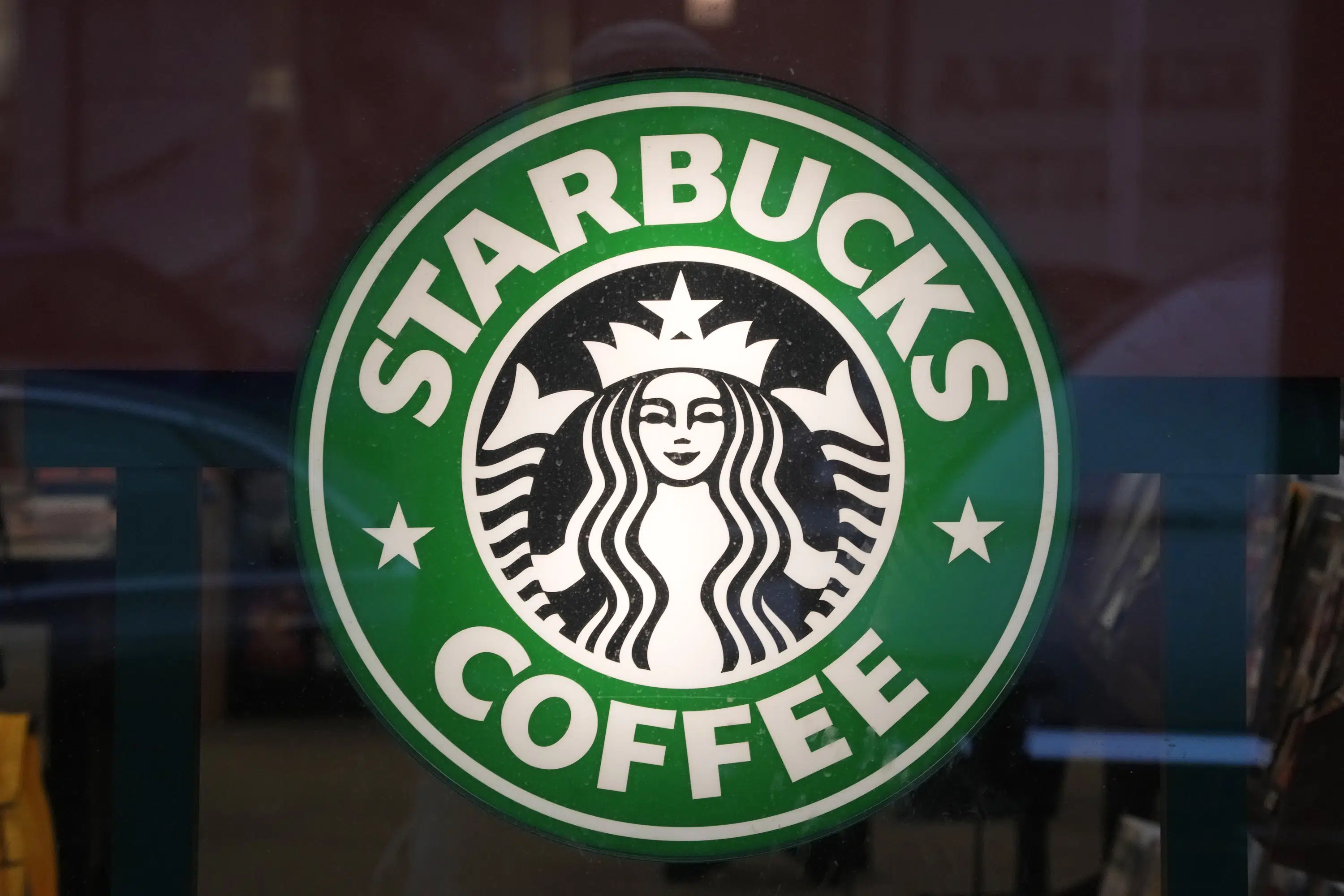 A jury has awarded $25.6 million to a white Starbucks manager who was fired after two black men were arrested.
