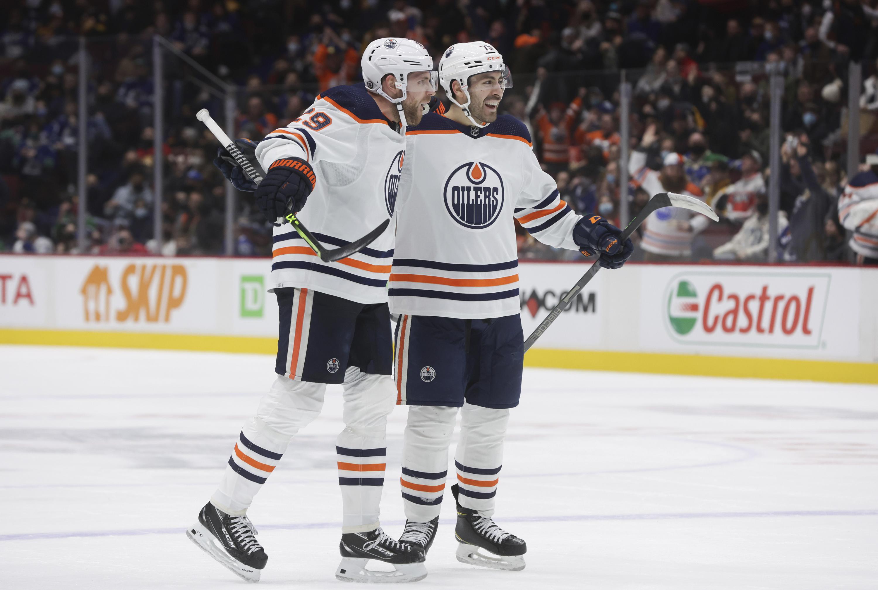 Oilers score in OT with seconds left for 32 win vs. Canucks AP News