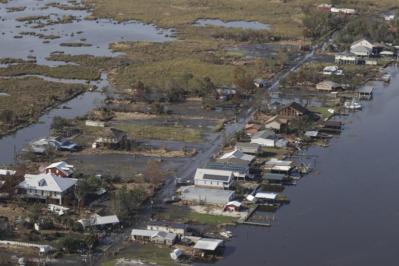 A view of flood damaged buildings are seen as President Joe Biden (not pictured) inspects the damage from Hurricane Ida on the Marine One helicopter during an aerial tour of communities in Laffite, Grand Isle, Port Fourchon and Lafourche Parish, Louisiana, Friday, Sept. 3, 2021. (Jonathan Ernst/Pool via AP)