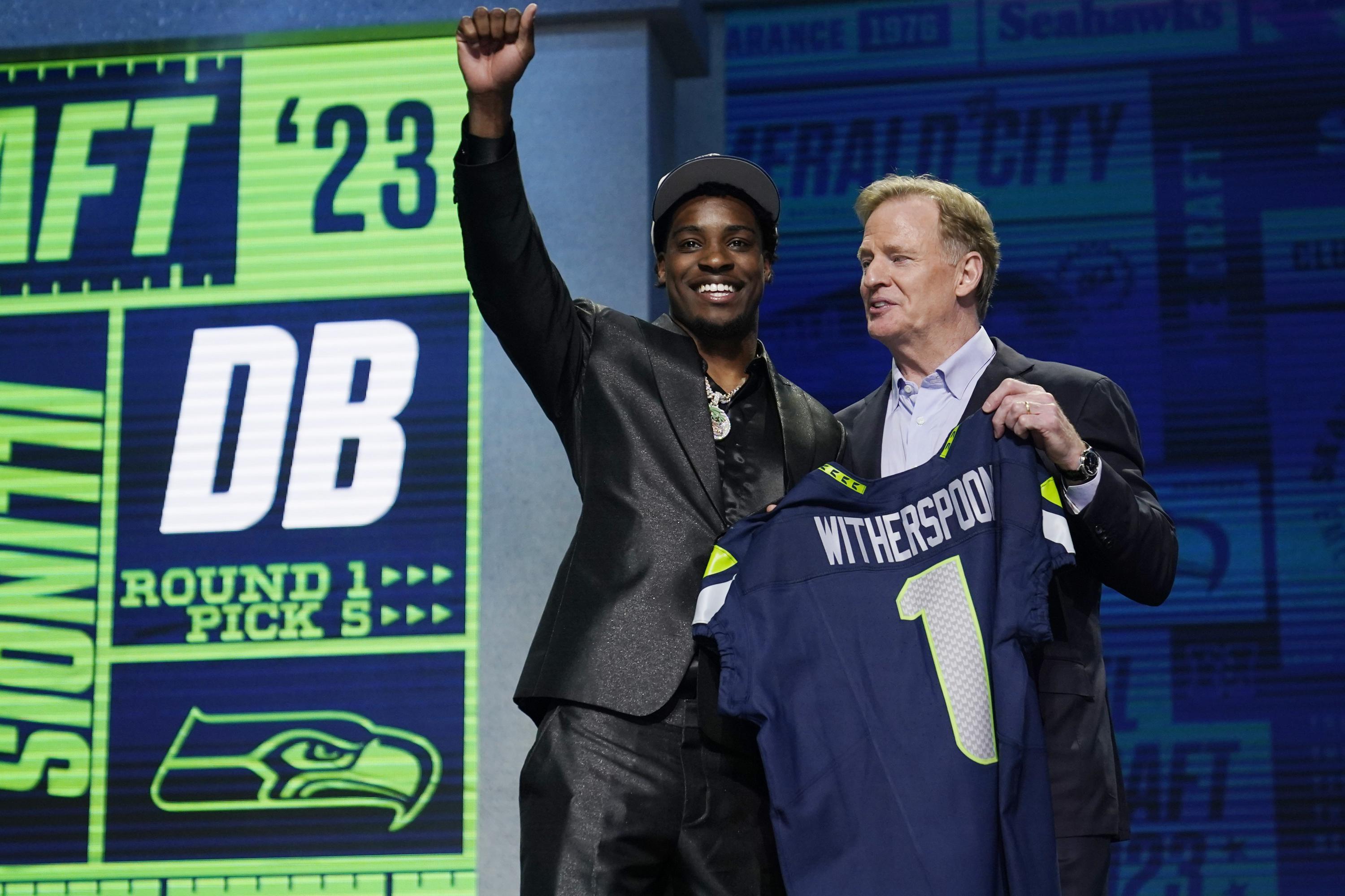 Seahawks take Witherspoon at No. 5, SmithNjigba at No. 20 AP News