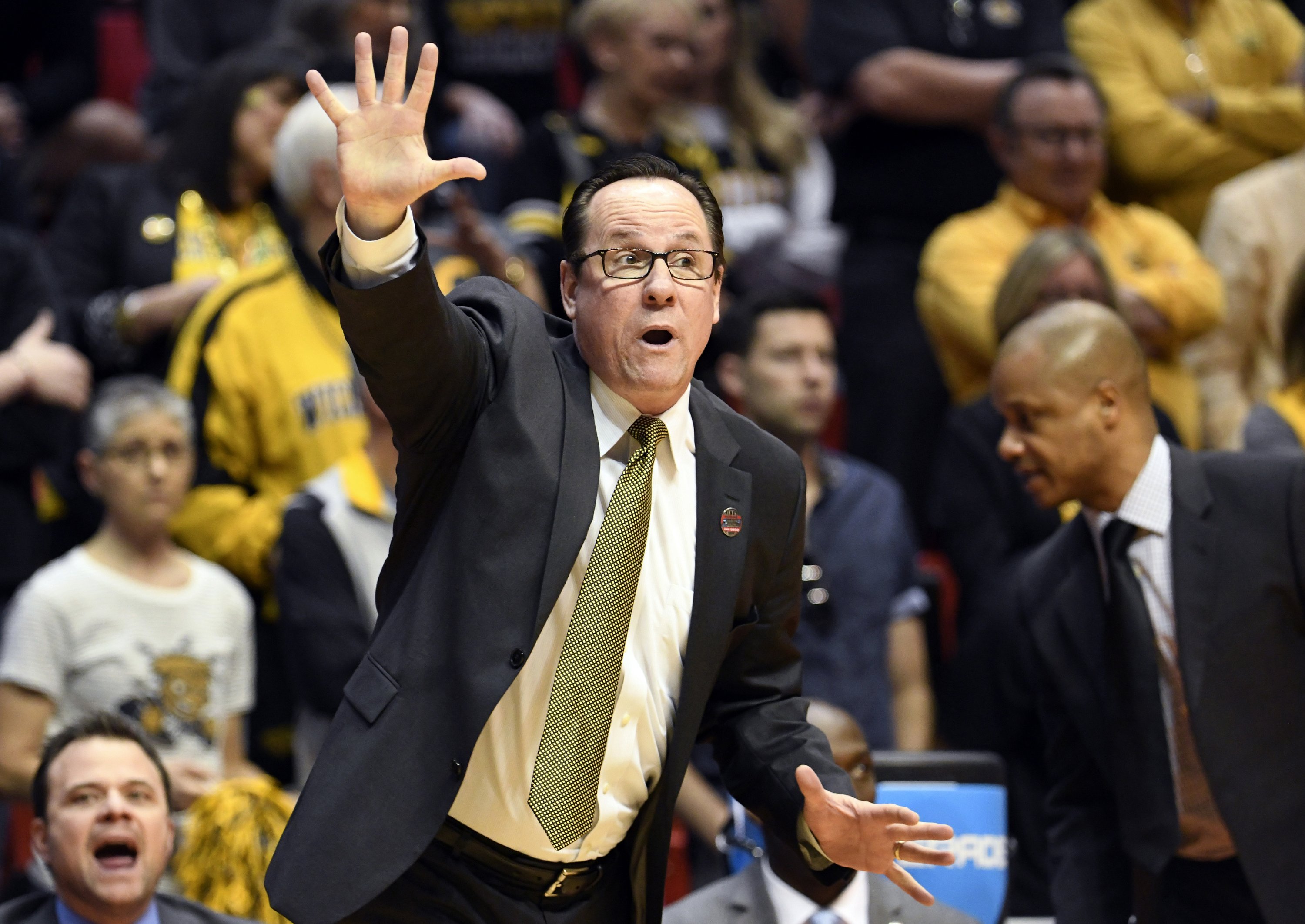 Wichita State coach Marshall resigns after misconduct probe | AP News