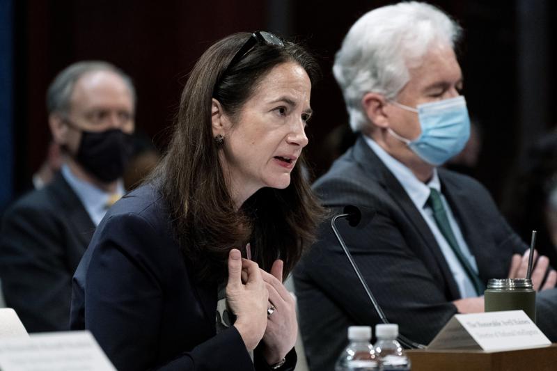 FILE - Director of National Intelligence Avril Haines, left, next to CIA Director William Burns, testifies at a House Intelligence committee hearing on diversity and equity in the intelligence community on Oct. 27, 2021, on Capitol Hill in Washington. Thousands of intelligence officers could soon face dismissal for failing to comply with the U.S. government's vaccine mandate, leading to concerns from Republican lawmakers about potentially hurting agencies considered critical to national security. Haines says she doesn't anticipate the mandate affecting the mission of national security agencies.  (AP Photo/Jacquelyn Martin, File)