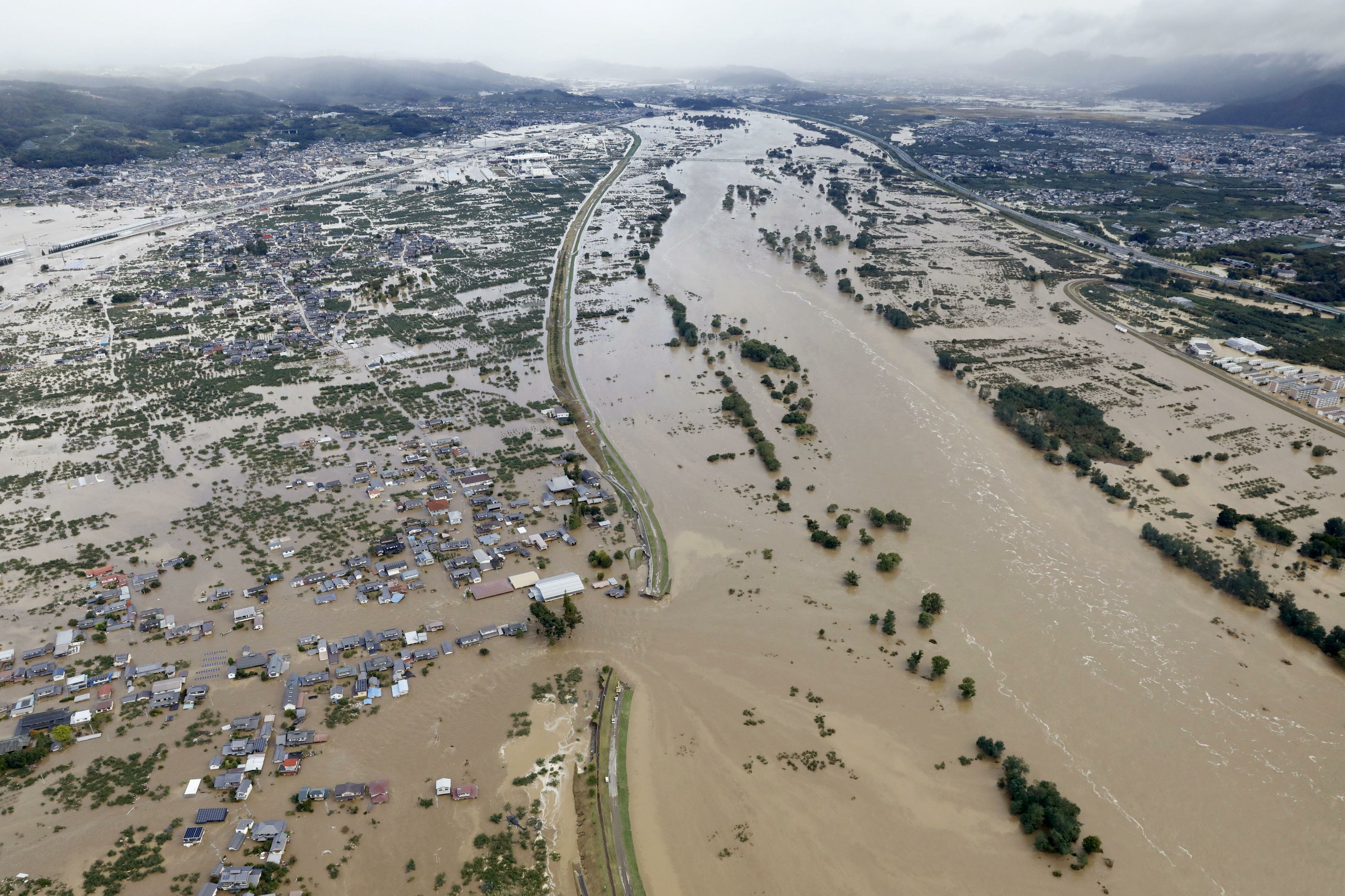 Rescue efforts underway after typhoon rains flood Japan