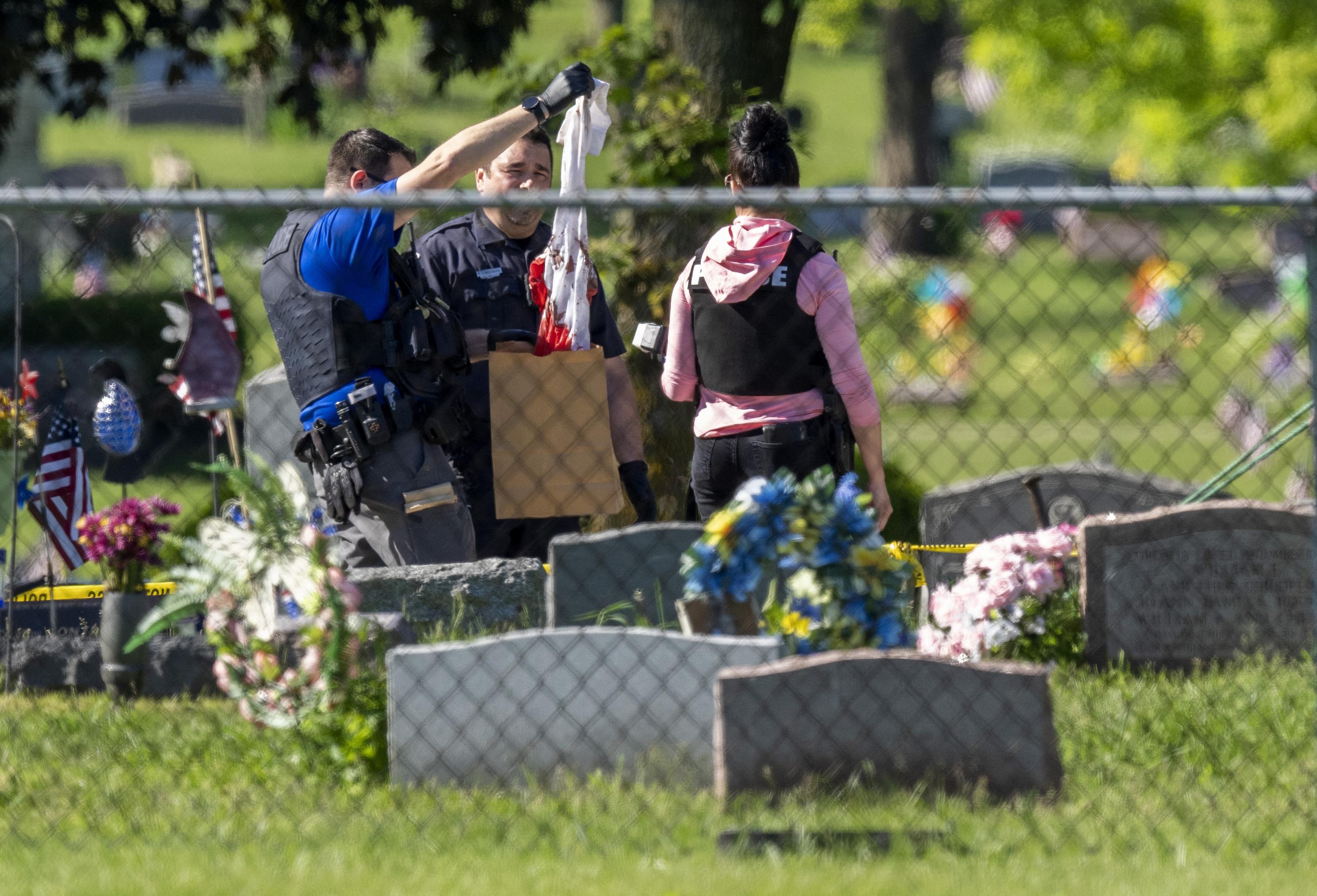 Police search for Wisconsin cemetery shooter who injured 2 AP News
