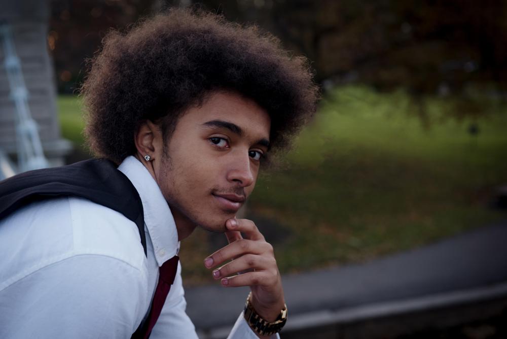 This photo provided by Irina Danilova shows Donovan Johnson at Boston Common in Boston, Nov. 17, 2019. A civil rights lawsuit filed Wednesday, Aug. 3, 2022, says Johnson was minutes away from his home after leaving his job at a hospital in February 2021 when an officer who was chasing a white suspect ran up to Johnson, drew his gun and threw him to the snow-covered ground face first. (Irina Danilova via AP) This photo provided by Irina Danilova shows Donovan Johnson at Boston Common in Boston, Nov. 17, 2019. A civil rights lawsuit filed Wednesday, Aug. 3, 2022, says Johnson was minutes away from his home after leaving his job at a hospital in February 2021 when an officer who was chasing a white suspect ran up to Johnson, drew his gun and threw him to the snow-covered ground face first. (Irina Danilova via AP)