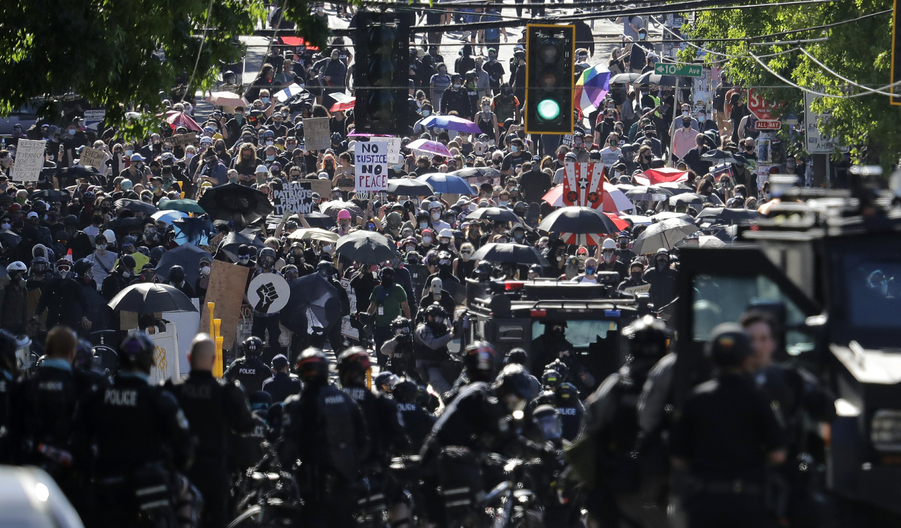 Police declare riot at Seattle protests, make arrests AP News