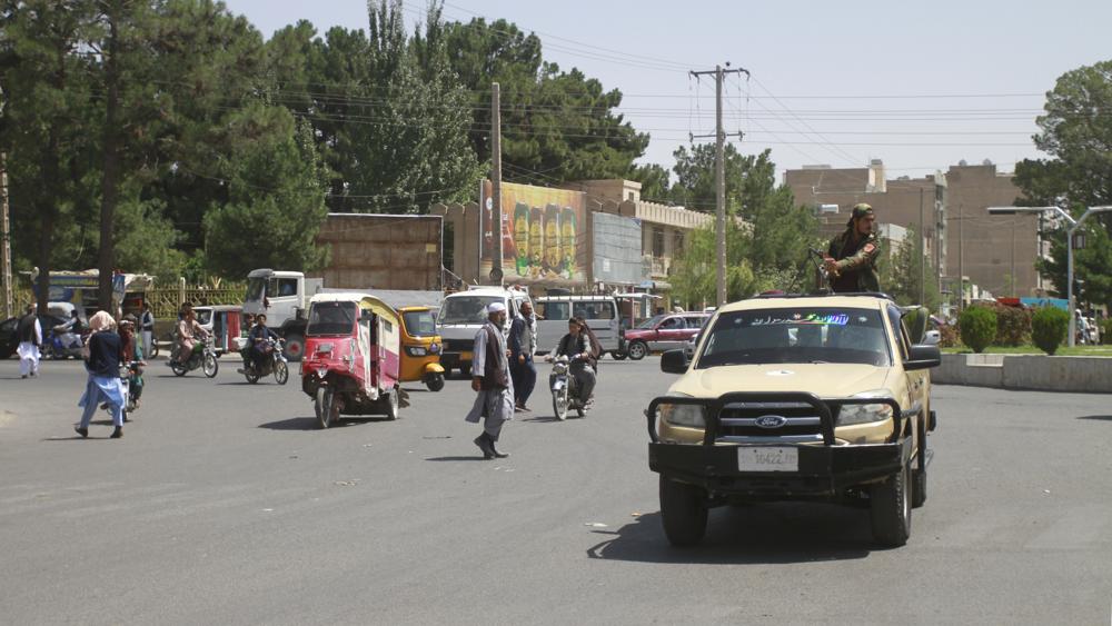 Members of the Taliban drive through the city of Herat, Afghanistan, west of Kabul, on Saturday, Aug. 14.2021, after taking the province from the Afghan government. (AP Photo/Hamed Sarfarazi