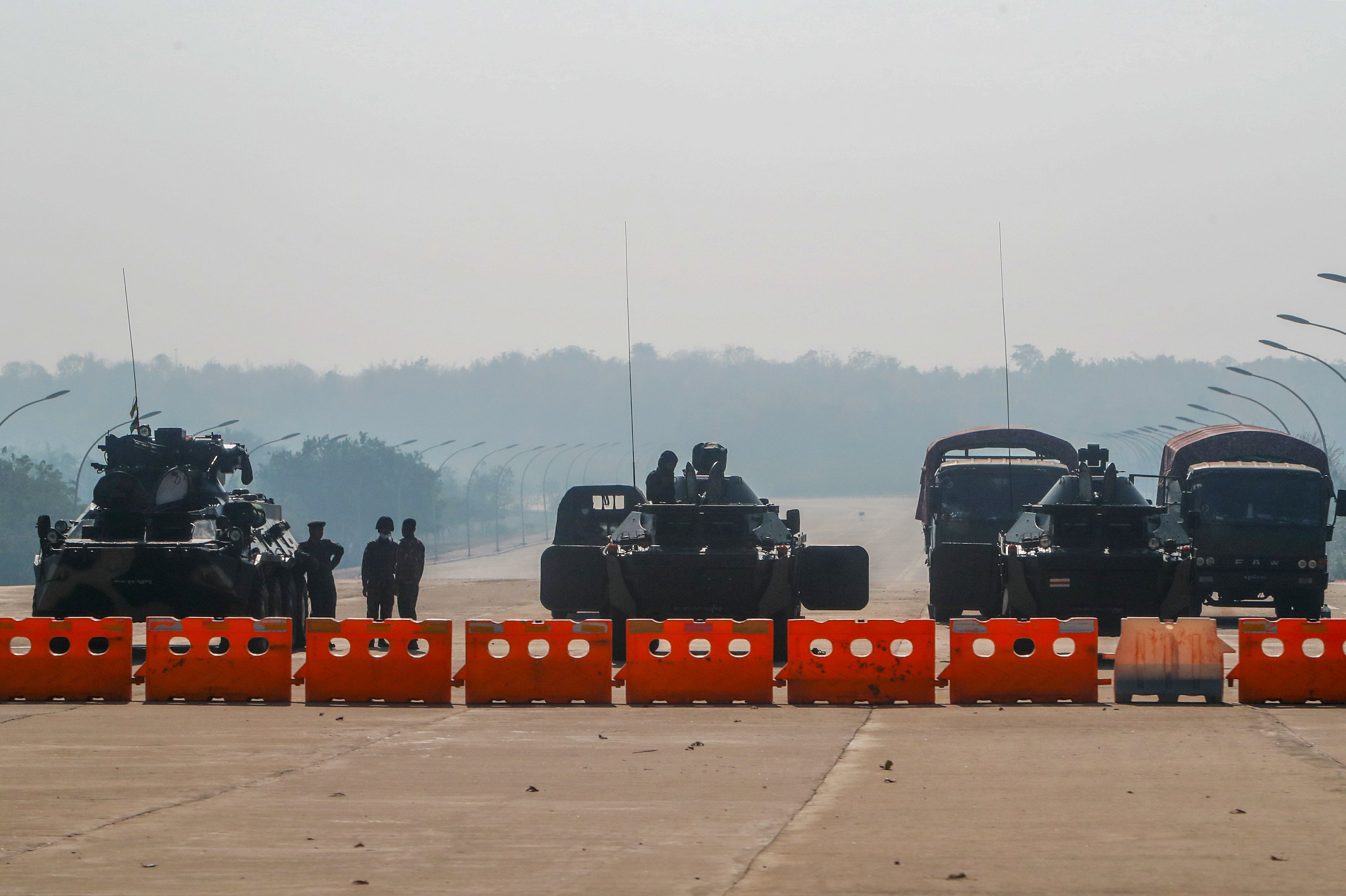 Myanmar lawmakers say the army is guarding their homes after the coup