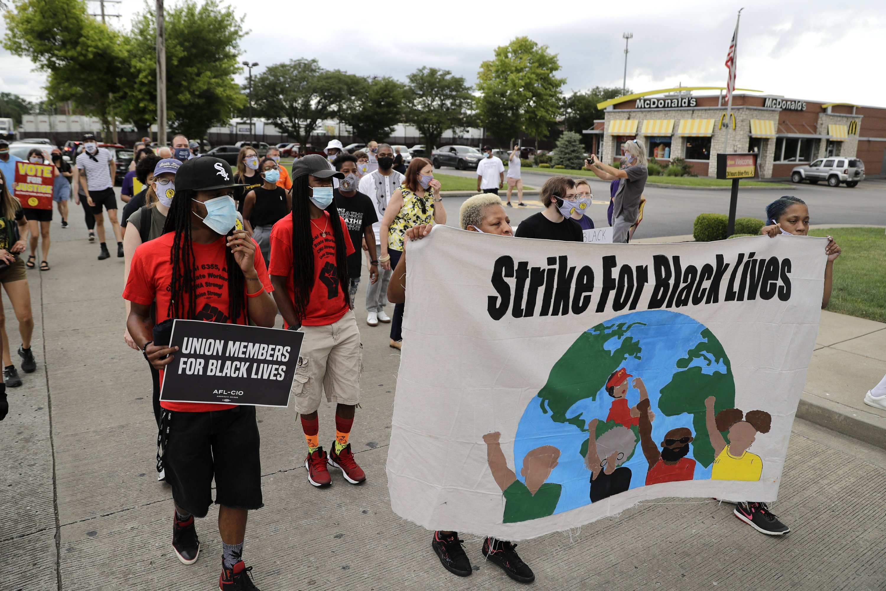 Workers protest racial inequality on day of national strike AP News