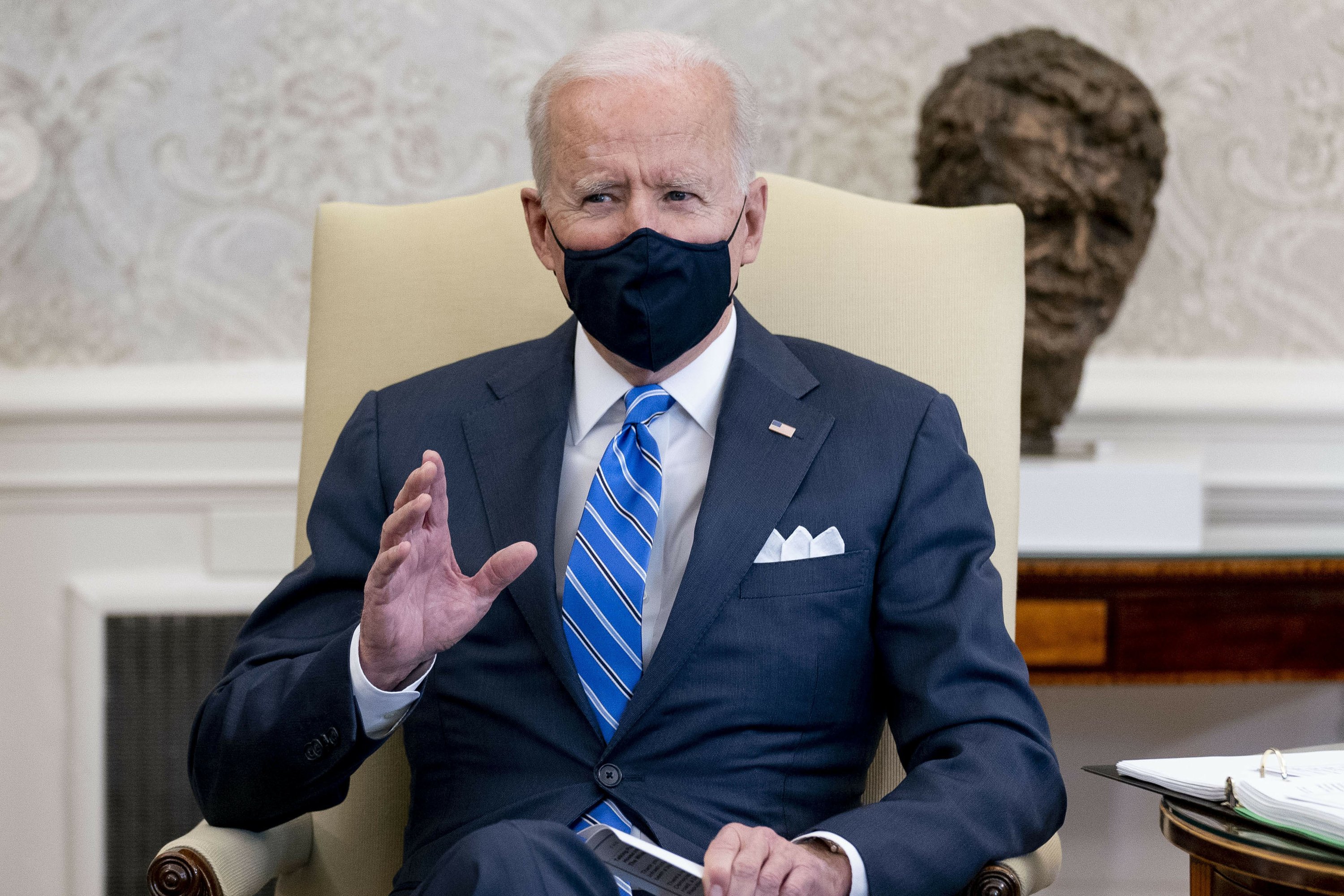 Biden gestures to replace war power authority