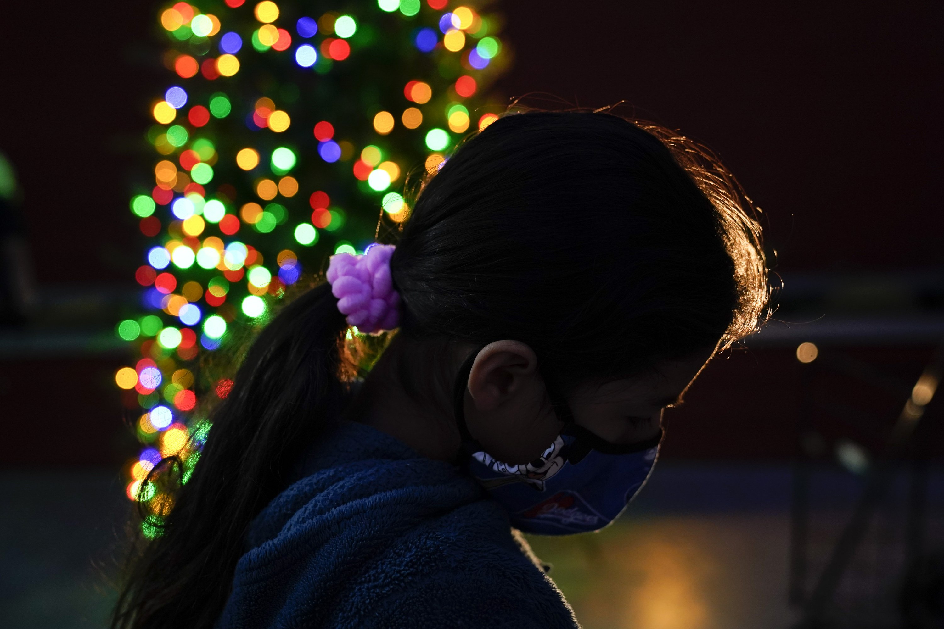 Americans tired of viruses less festive this year