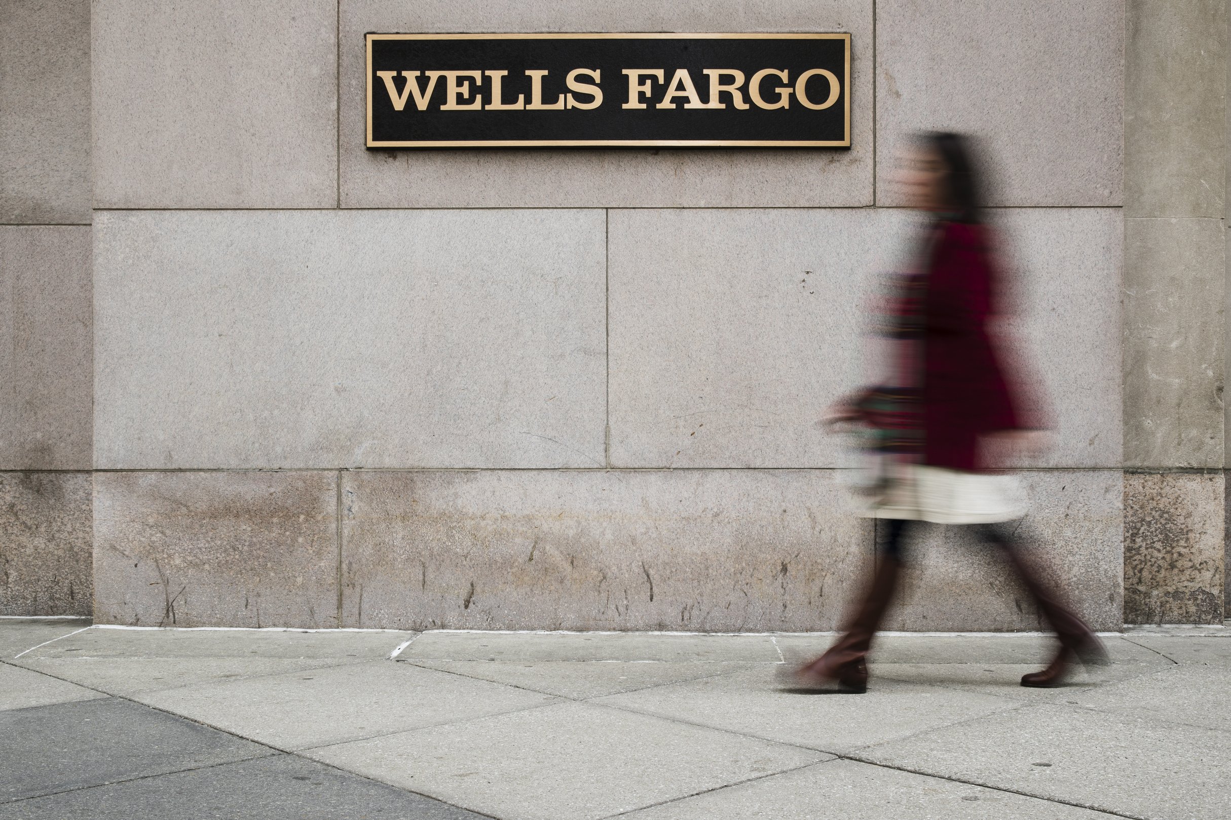 Wells Fargo takes 1Q earnings, revenue hit from virus AP News