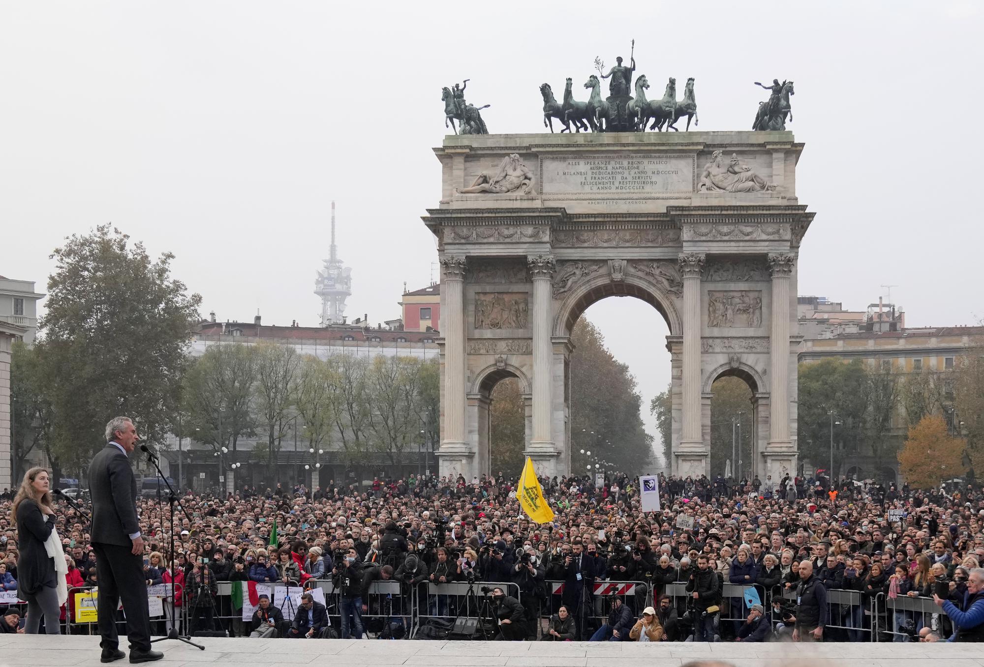 FILE - Robert F. Kennedy, Jr., speaks during a protest against the COVID-19 vaccination green pass in Milan, Italy, Saturday, Nov. 13, 2021. The pandemic has helped Kennedy take Children’s Health Defense’s anti-vaccine message global. (AP Photo/Antonio Calanni, File)