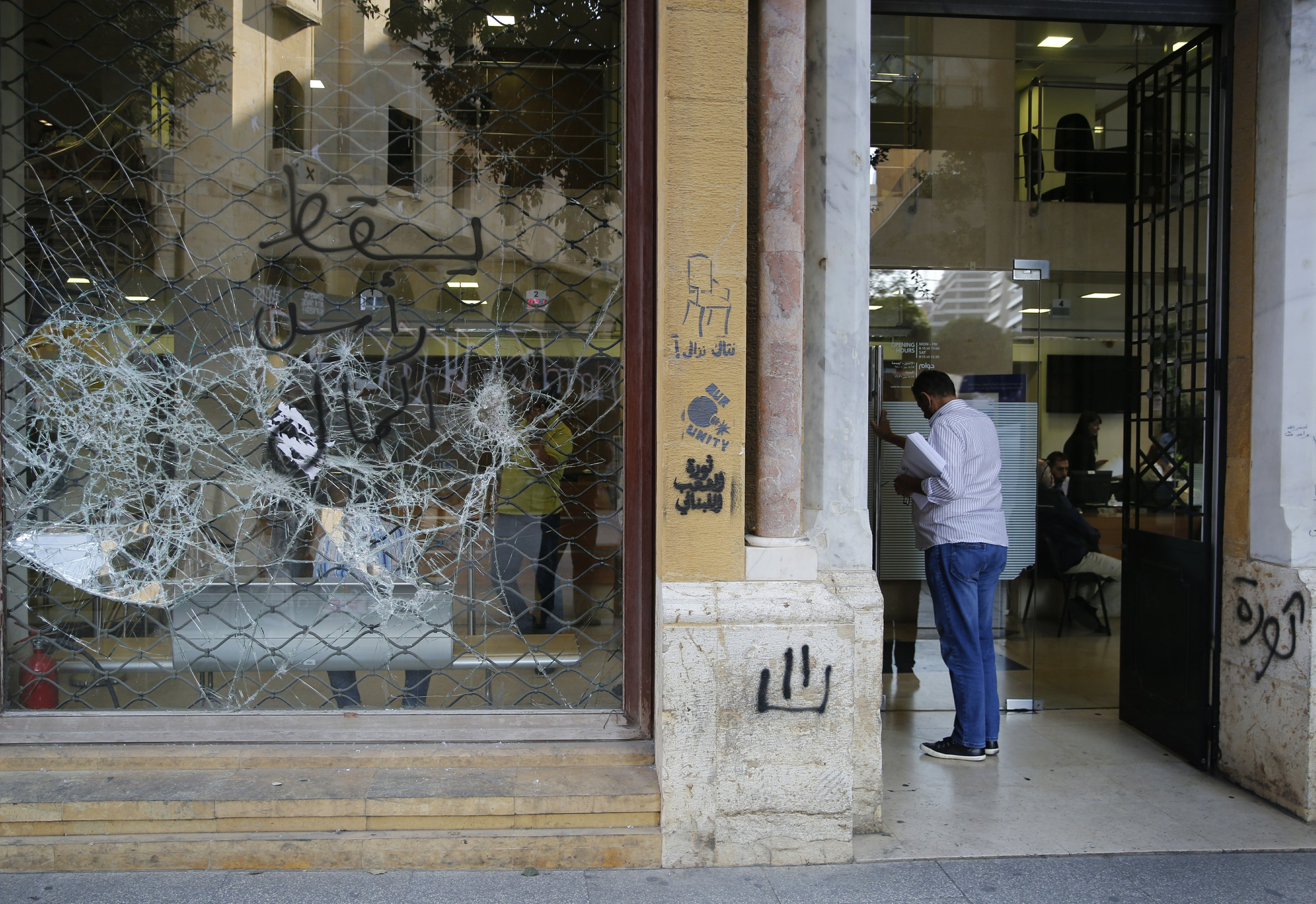 Lebanon's banks reopen after 2week closure due to protests AP News