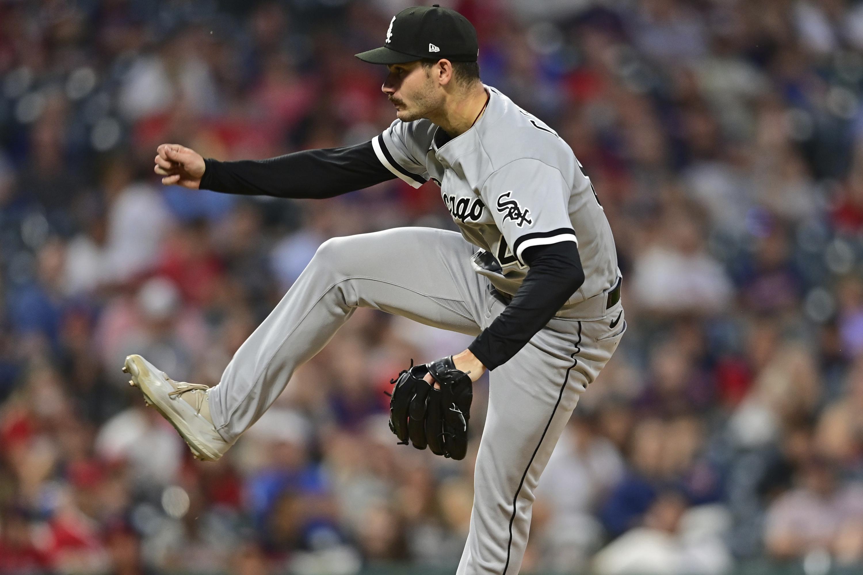 Cease strikes out nine, White Sox split DH with Guardians AP News