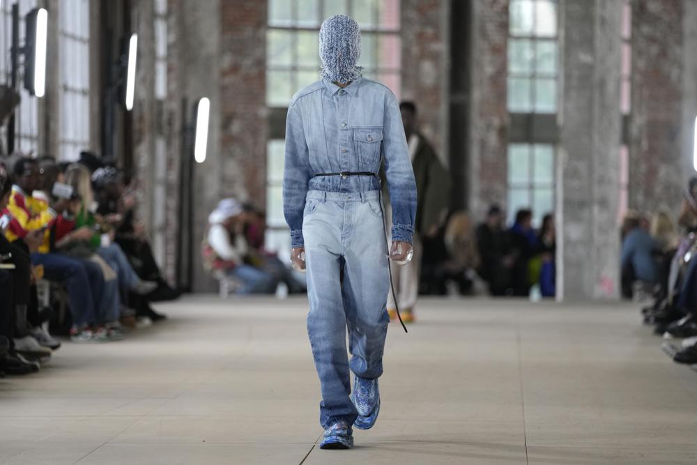 A model wears a creation for Botter for the ready-to-wear Spring/Summer 2023 fashion collection presented Tuesday, Sept. 27, 2022 in Paris. (AP Photo/Francois Mori)