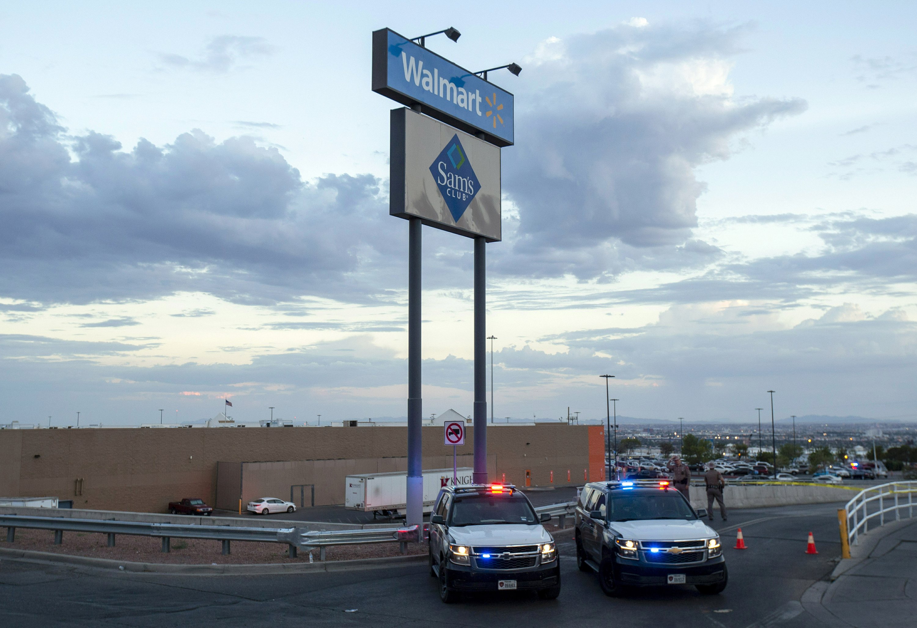 Walmart hires off-duty officers ahead of El Paso reopening | AP News