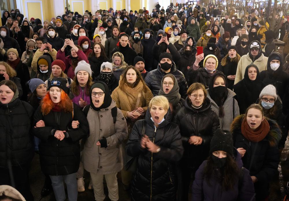 Demonstrators shout slogans in St. Petersburg, Russia, Friday, Feb. 25, 2022. Shocked Russians turned out by the thousands Thursday to decry their country's invasion of Ukraine as emotional calls for protests grew on social media. Some 1,745 people in 54 Russian cities were detained, at least 957 of them in Moscow. (AP Photo/Dmitri Lovetsky)