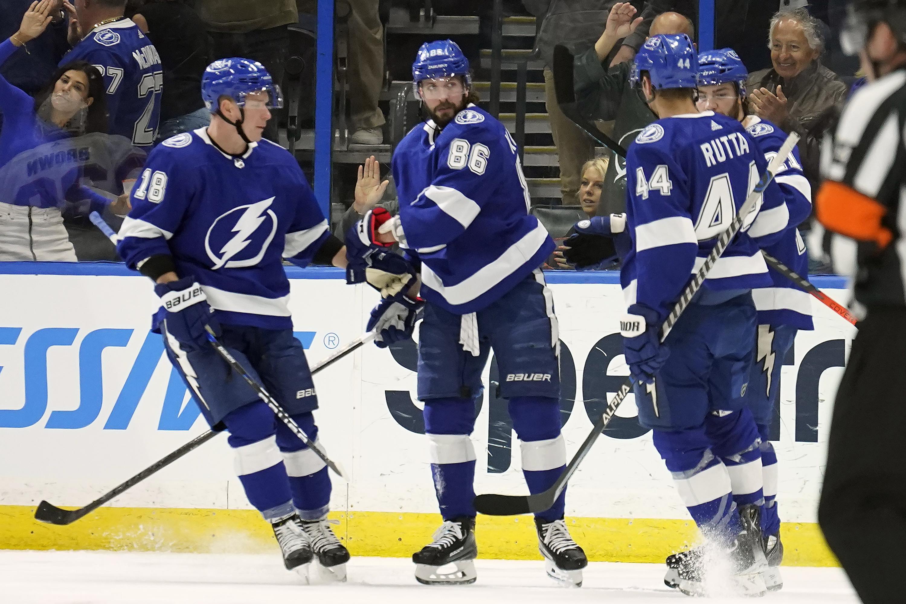 Point has goal, 3 assists as Lightning beat Senators 5-2 | AP News