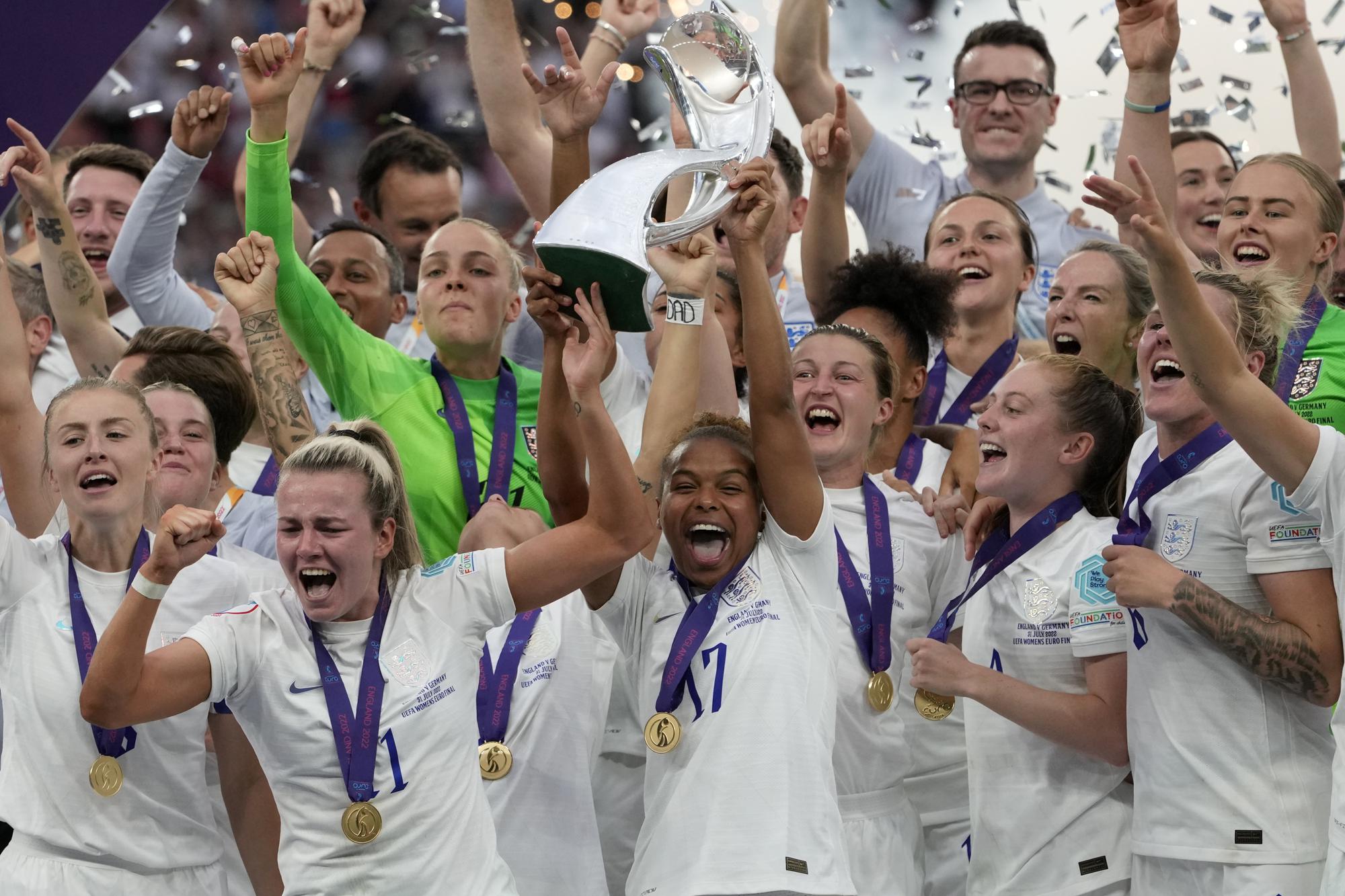 FILE - England's Nikita Parris lifts the trophy after winning the Women's Euro 2022 final soccer match between England and Germany at Wembley stadium in London, Sunday, July 31, 2022. England won 2-1. (AP Photo/Alessandra Tarantino, File)