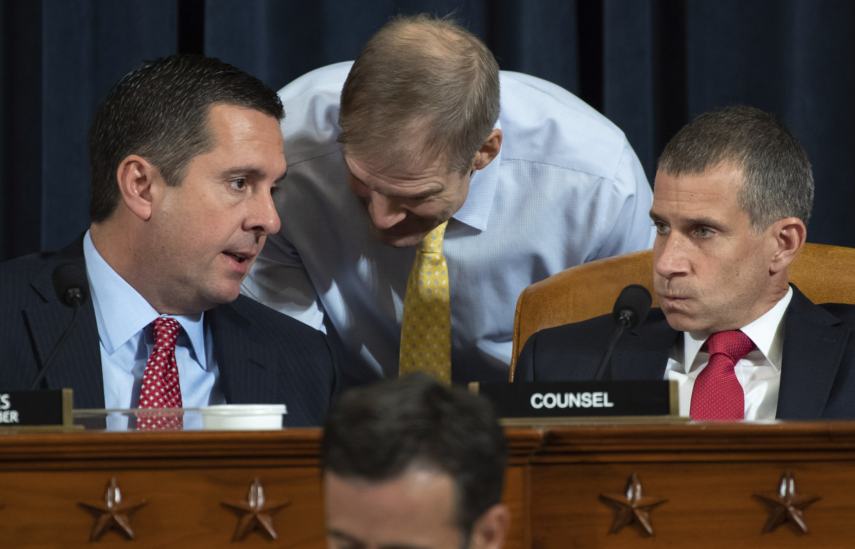 The Latest: Nunes defends Trump in impeachment hearing