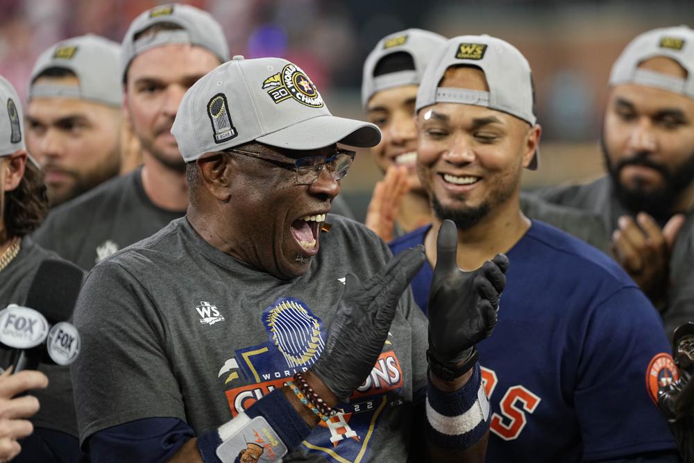 Houston Astros manager Dusty Baker Jr., and the Houston Astros celebrate their 4-1 World Series win against the Philadelphia Phillies in Game 6 on Saturday, Nov. 5, 2022, in Houston. (AP Photo/David J. Phillip)