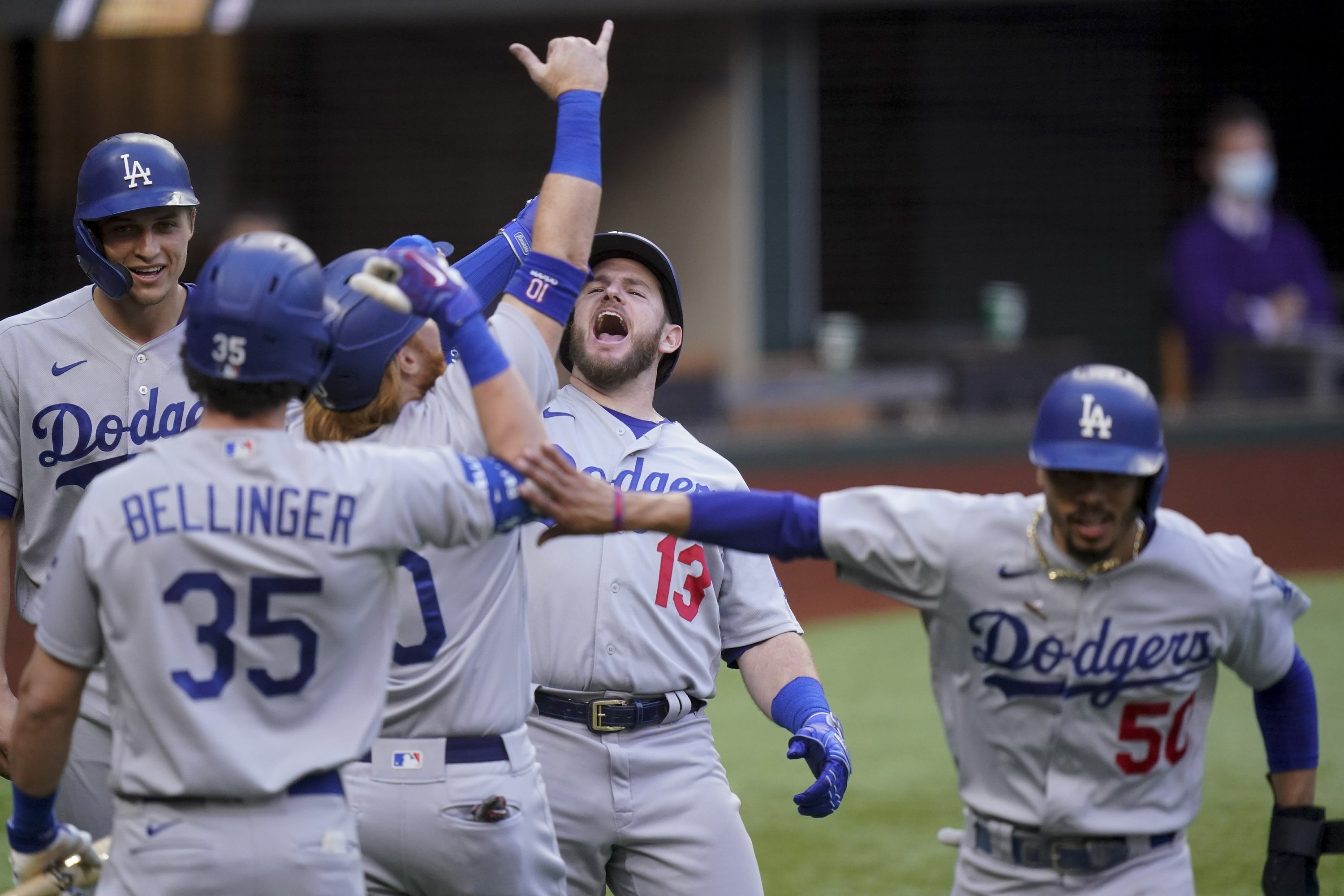 Dodgers score record 11 runs in 1st inning vs Braves in NLCS AP News