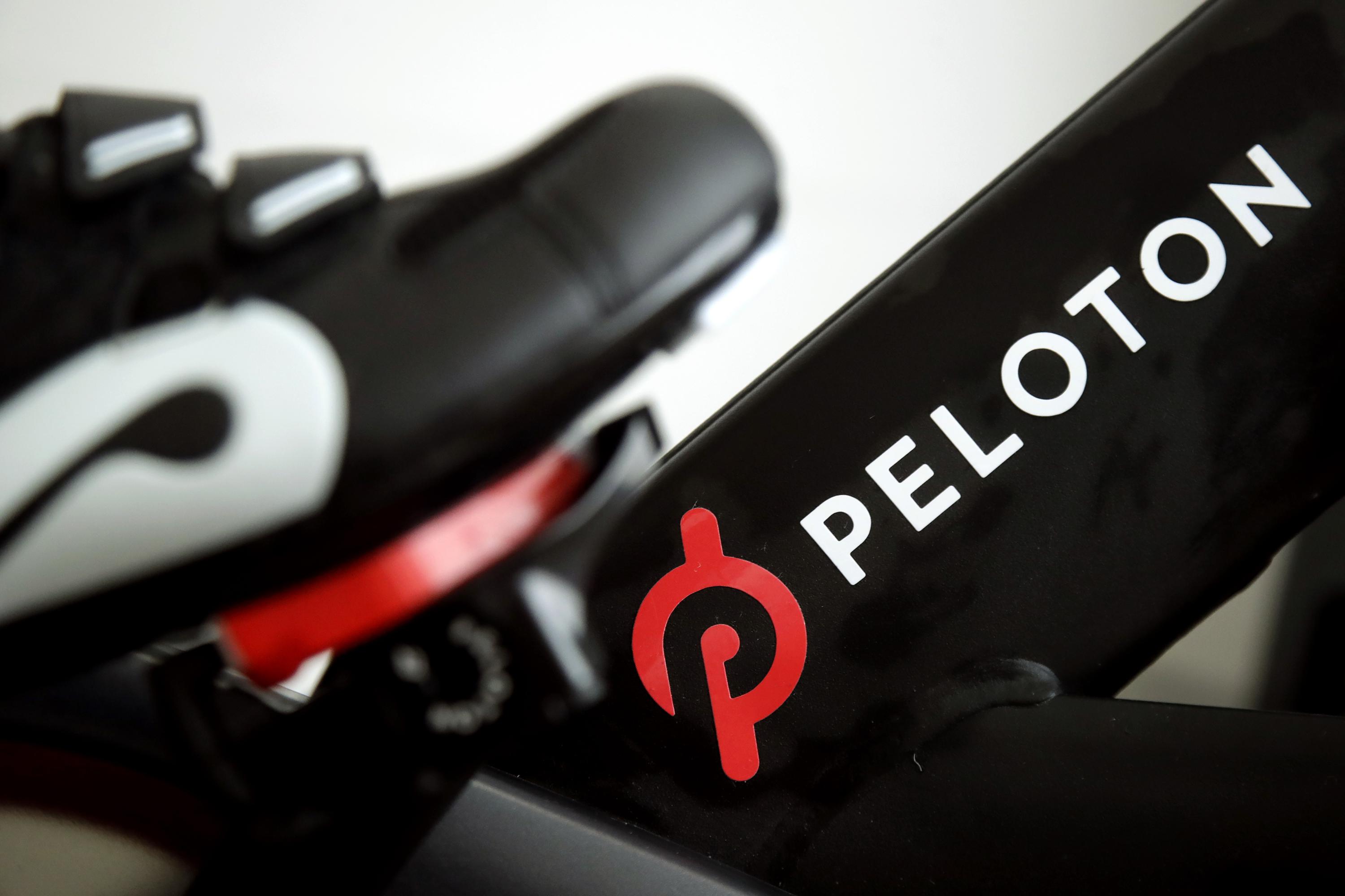 Peloton stock skids as company posts loss, cuts bike price