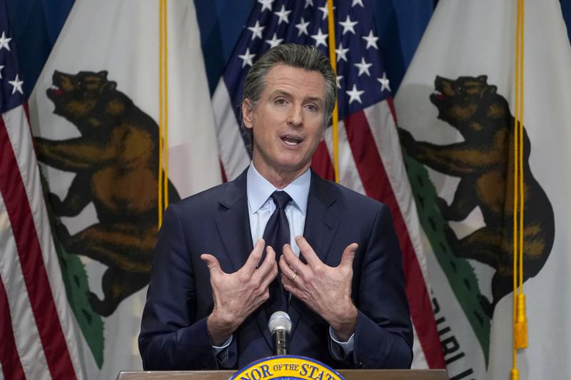FILE - In this Jan. 8, 2021, file photo, California Gov. Gavin Newsom gestures during a news conference in Sacramento, Calif. California on Thursday, July 1, 2021 scheduled a Sept. 14 recall election that could drive Democratic Gov. Gavin Newsom from office, the result of a political uprising largely driven by angst over state coronavirus orders that shuttered schools and businesses and upended life for millions of Californians. (AP Photo/Rich Pedroncelli, Pool, File)