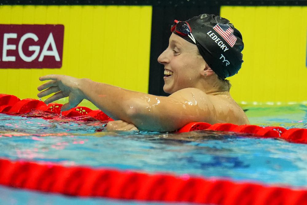 Katie Ledecky of United States celebrates after finishing first in the women's 400m freestyle final at the 19th FINA World Championships in Budapest, Hungary, Saturday, June 18, 2022. (AP Photo/Petr David Josek)